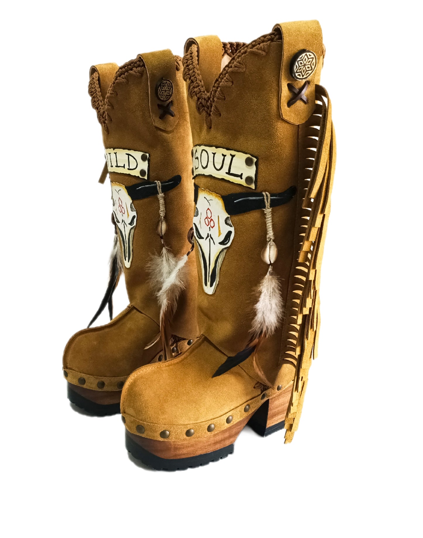 Camel suede cowboy boots. Clogs with hand-painted buffalo head, feathers, and fringes. Bohemian-style boots. High-end footwear handmade by Sol Caleyo.