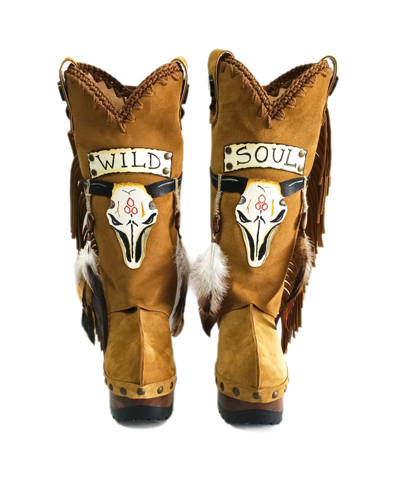 Camel suede cowboy boots. Clogs with hand-painted buffalo head, feathers, and fringes. Bohemian-style boots. High-end footwear handmade by Sol Caleyo.