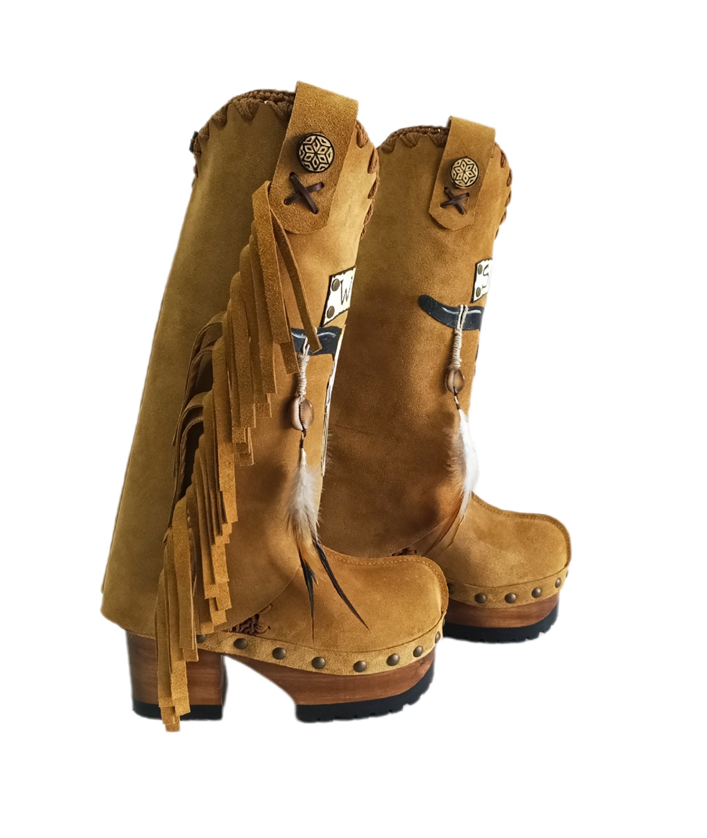 Camel suede cowboy boots. Clogs with hand-painted buffalo head, feathers, and fringes. Bohemian-style boots. High-end footwear handmade by Sol Caleyo.