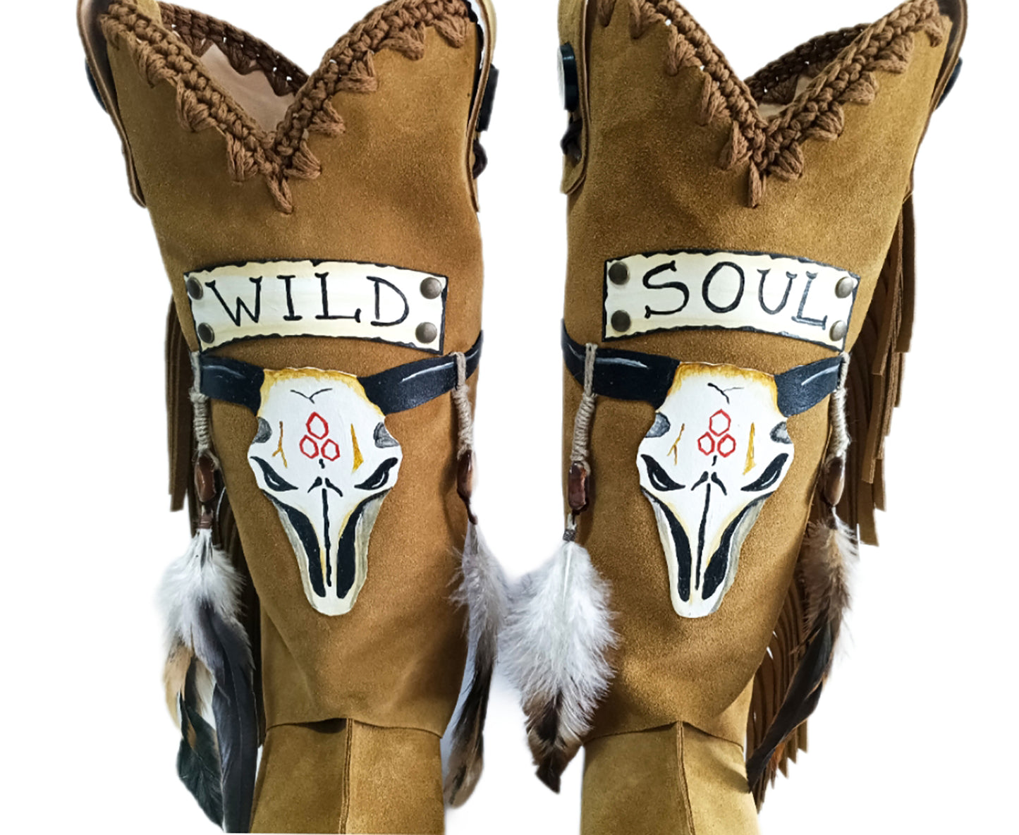 Camel suede cowboy boots. Clogs with hand-painted buffalo head, feathers, and fringes. Bohemian-style boots. High-end footwear handmade by Sol Caleyo.