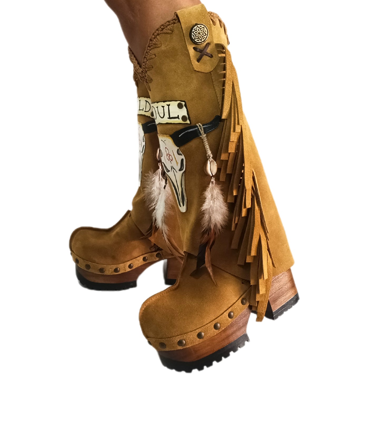 Camel suede cowboy boots. Clogs with hand-painted buffalo head, feathers, and fringes. Bohemian-style boots. High-end footwear handmade by Sol Caleyo.
