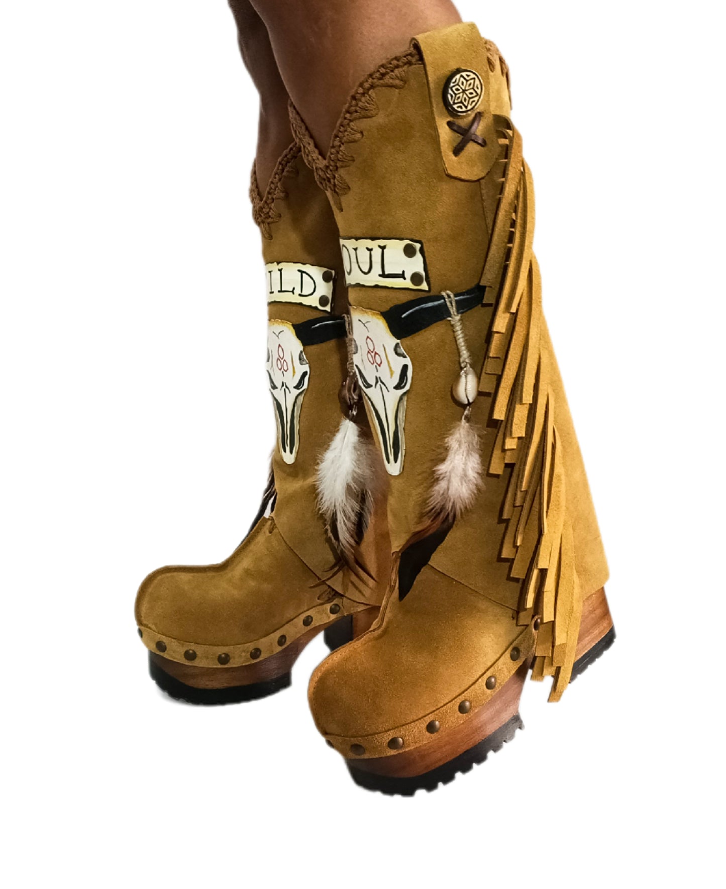 Camel suede cowboy boots. Clogs with hand-painted buffalo head, feathers, and fringes. Bohemian-style boots. High-end footwear handmade by Sol Caleyo.