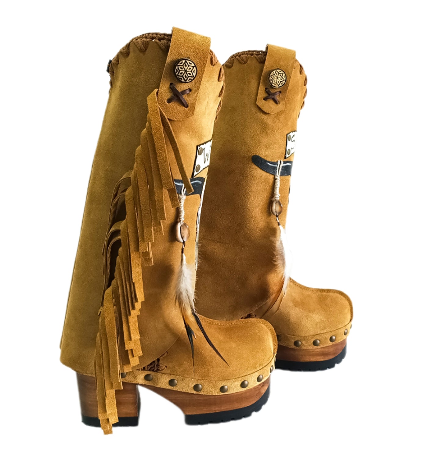 Camel suede cowboy boots. Clogs with hand-painted buffalo head, feathers, and fringes. Bohemian-style boots. High-end footwear handmade by Sol Caleyo.