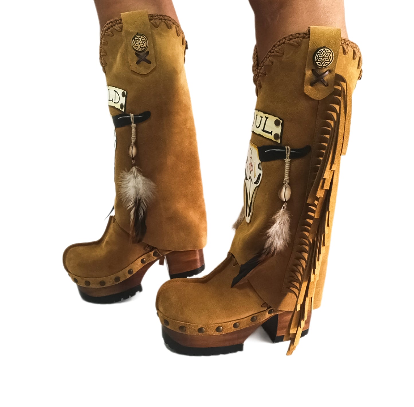 Camel suede cowboy boots. Clogs with hand-painted buffalo head, feathers, and fringes. Bohemian-style boots. High-end footwear handmade by Sol Caleyo.