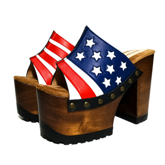 Sandals with a unique American flag design. Vintage-style platform sandals with wooden heels. Heels with a unique American flag design. High-end footwear handmade to order. Exclusive design by Sol Caleyo.