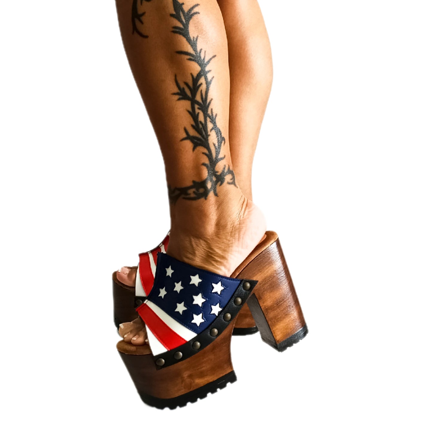 Sandals with a unique American flag design. Vintage-style platform sandals with wooden heels. Heels with a unique American flag design. High-end footwear handmade to order. Exclusive design by Sol Caleyo.