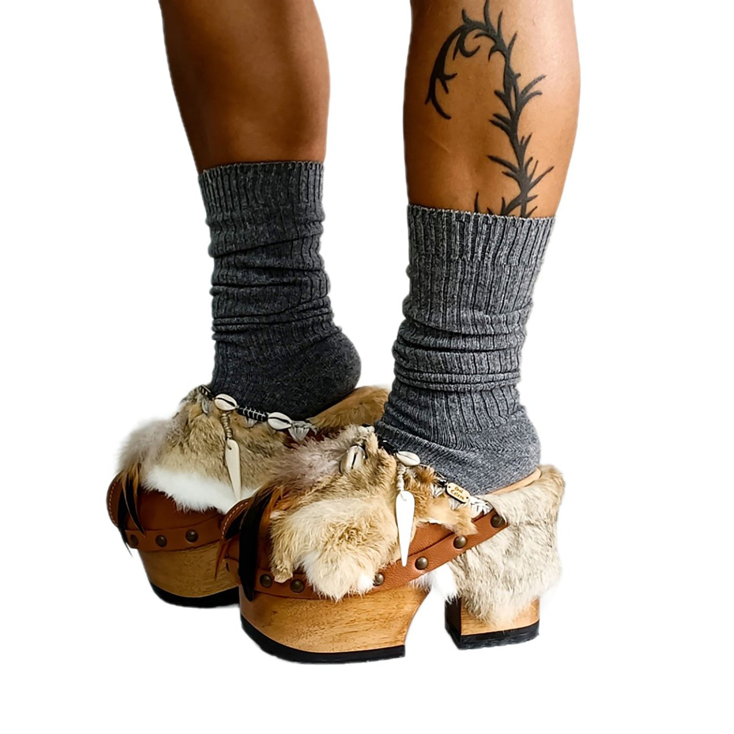 Rabbit fur and feather clogs. Vintage style platform clogs. Handmade leather clogs. Bohemian style clogs. High-end handmade footwear by Sol Caleyo.