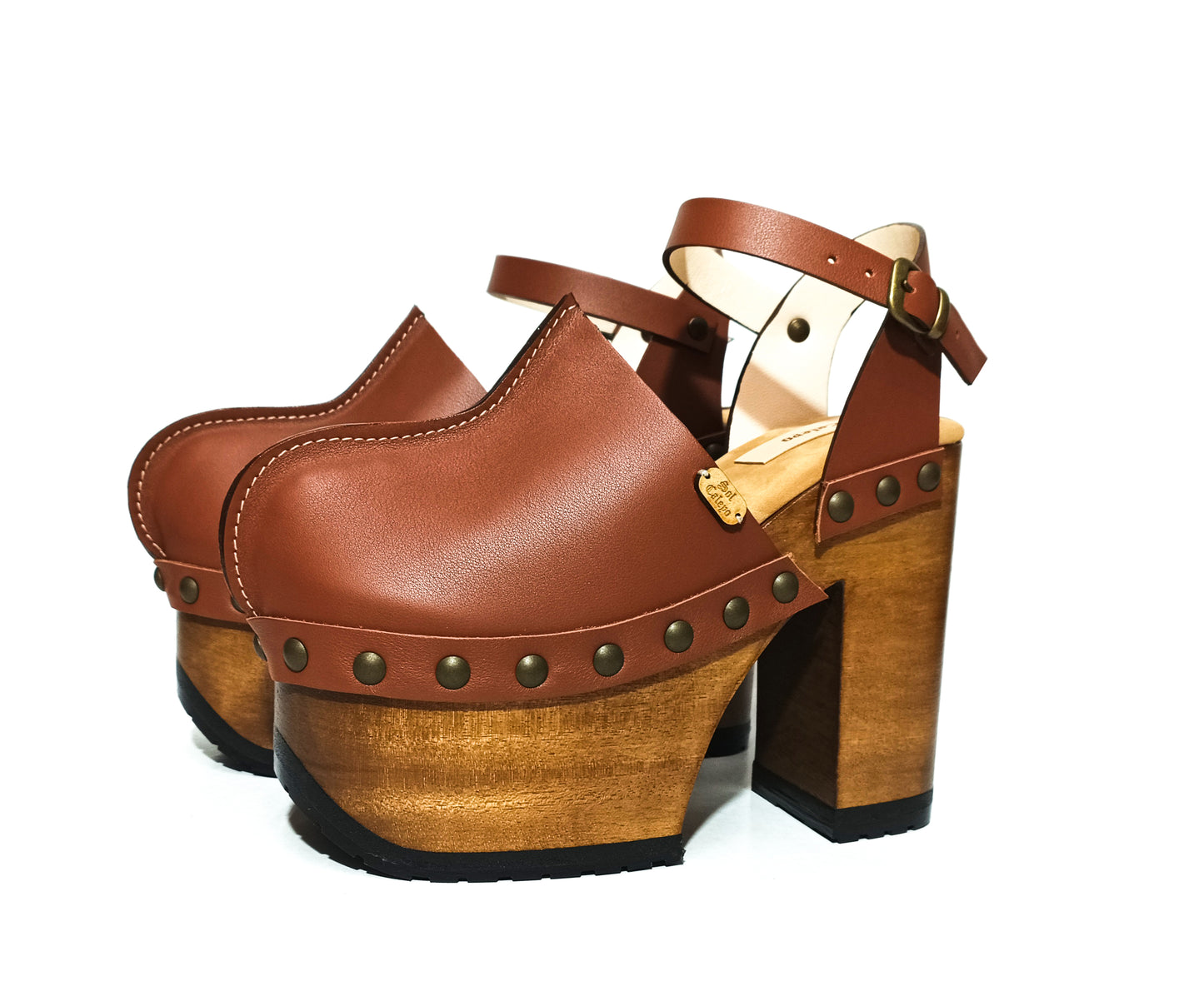 Platform clogs with super high heel and vintage 70s style. Vintage style brown leather clogs. Super high wooden heel. Sizes 34 to 47. High quality handmade leather shoes.