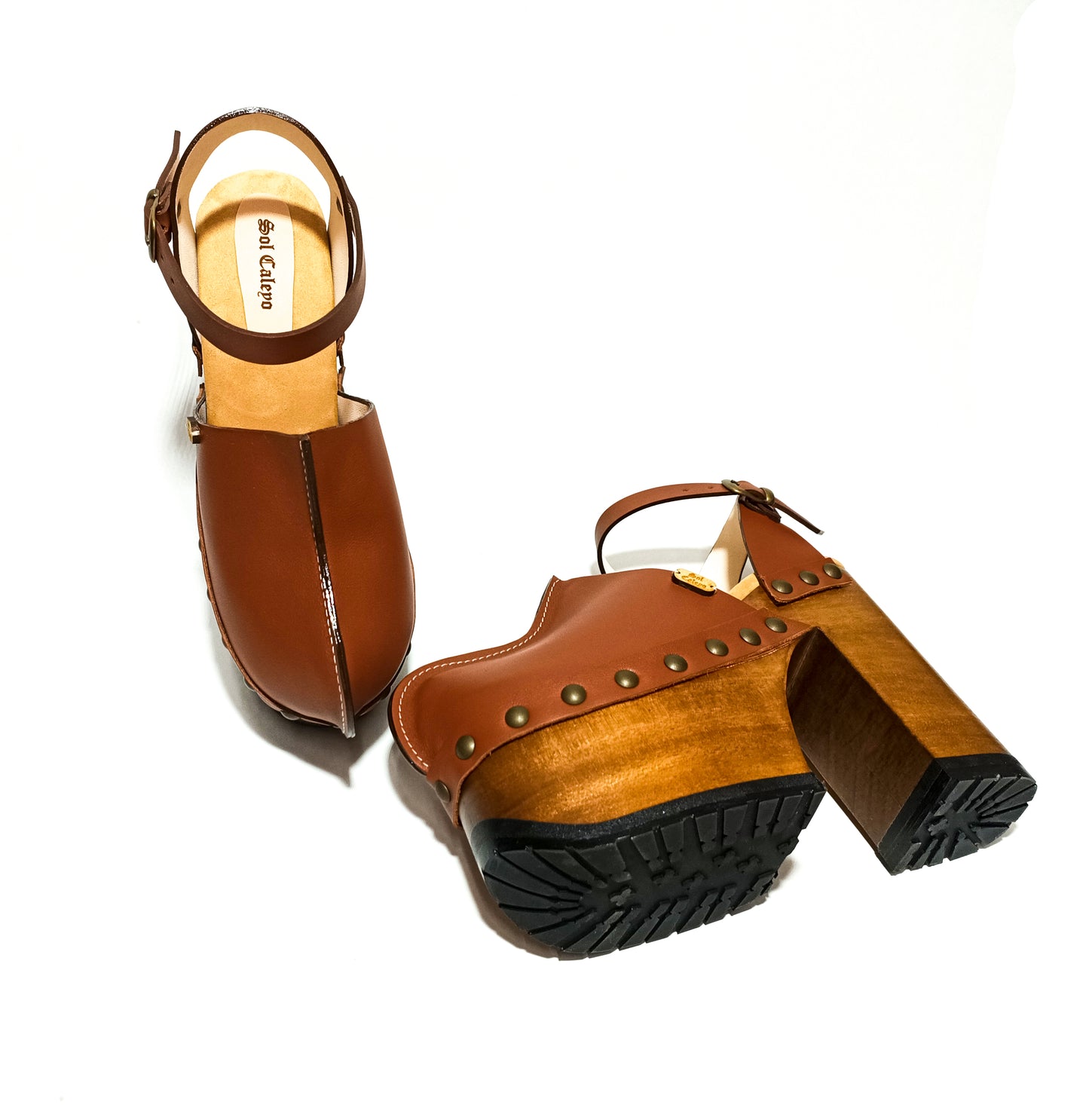 Platform clogs with super high heel and vintage 70s style. Vintage style brown leather clogs. Super high wooden heel. Sizes 34 to 47. High quality handmade leather shoes.