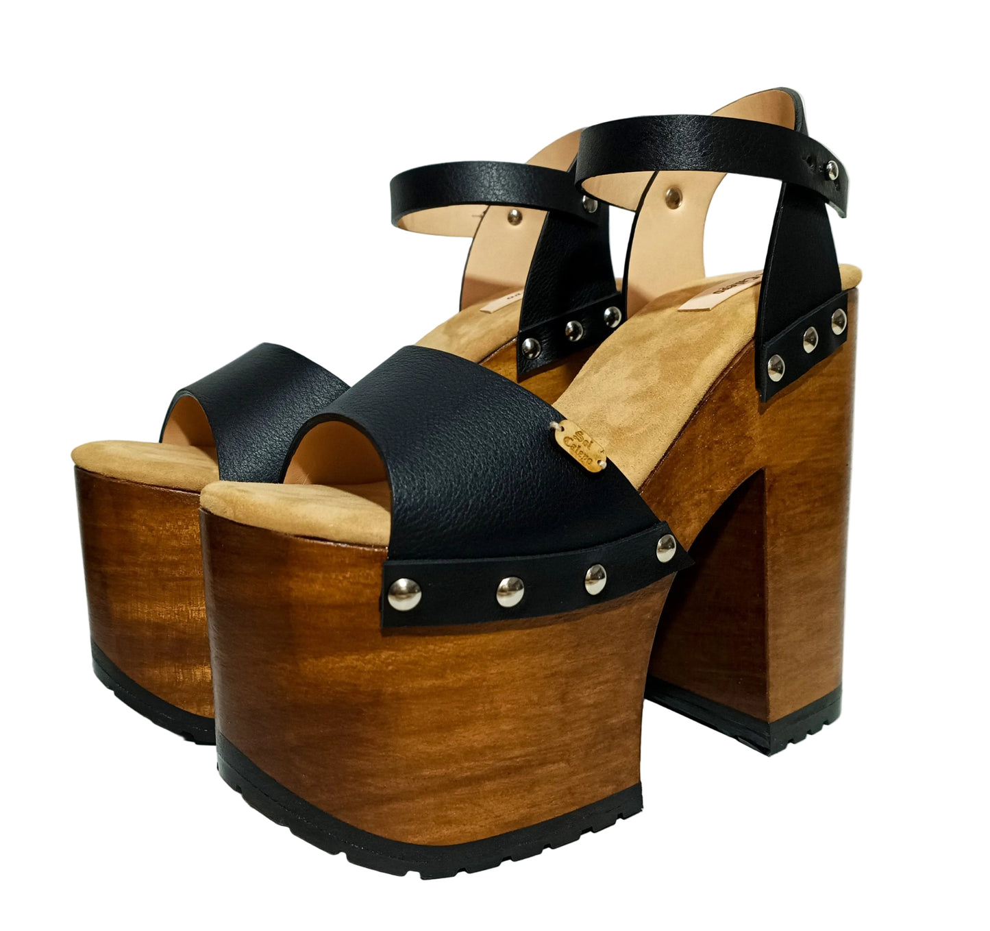 Vintage style platform sandals with super high wooden heels, made in leather. Sizes 34 to 47. Super high wooden heels inspired by the 70s. Exclusive handmade design. High quality footwear handmade by sol Caleyo.