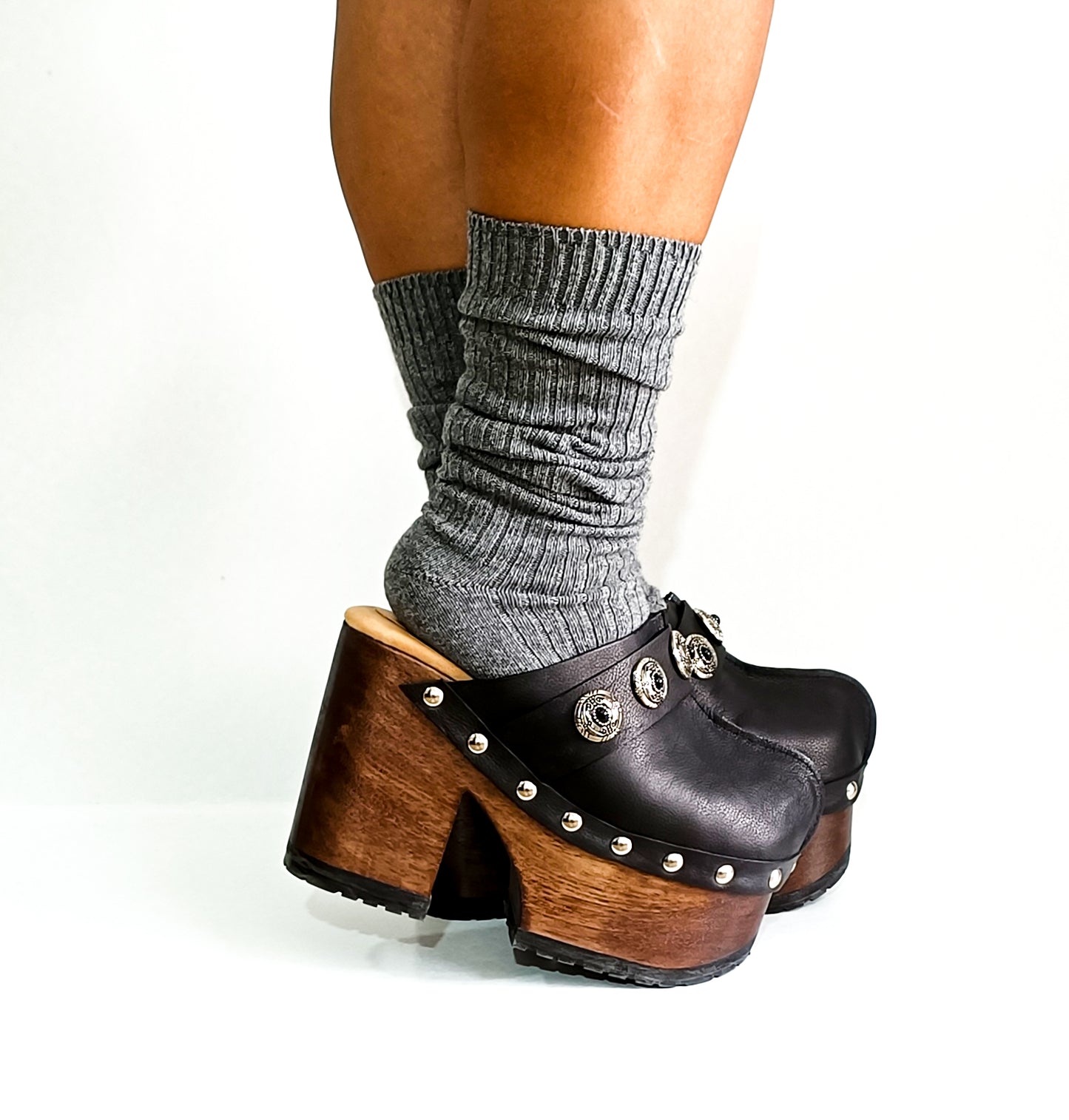 Vintage style black leather clogs. Super high heel clog decorated with vintage silver conchos. Bohemian style mule. Vintage 70's style platform clogs. Sizes 34 to 47. High quality leather shoes handmade by sol Caleyo. Sustainable fashion.