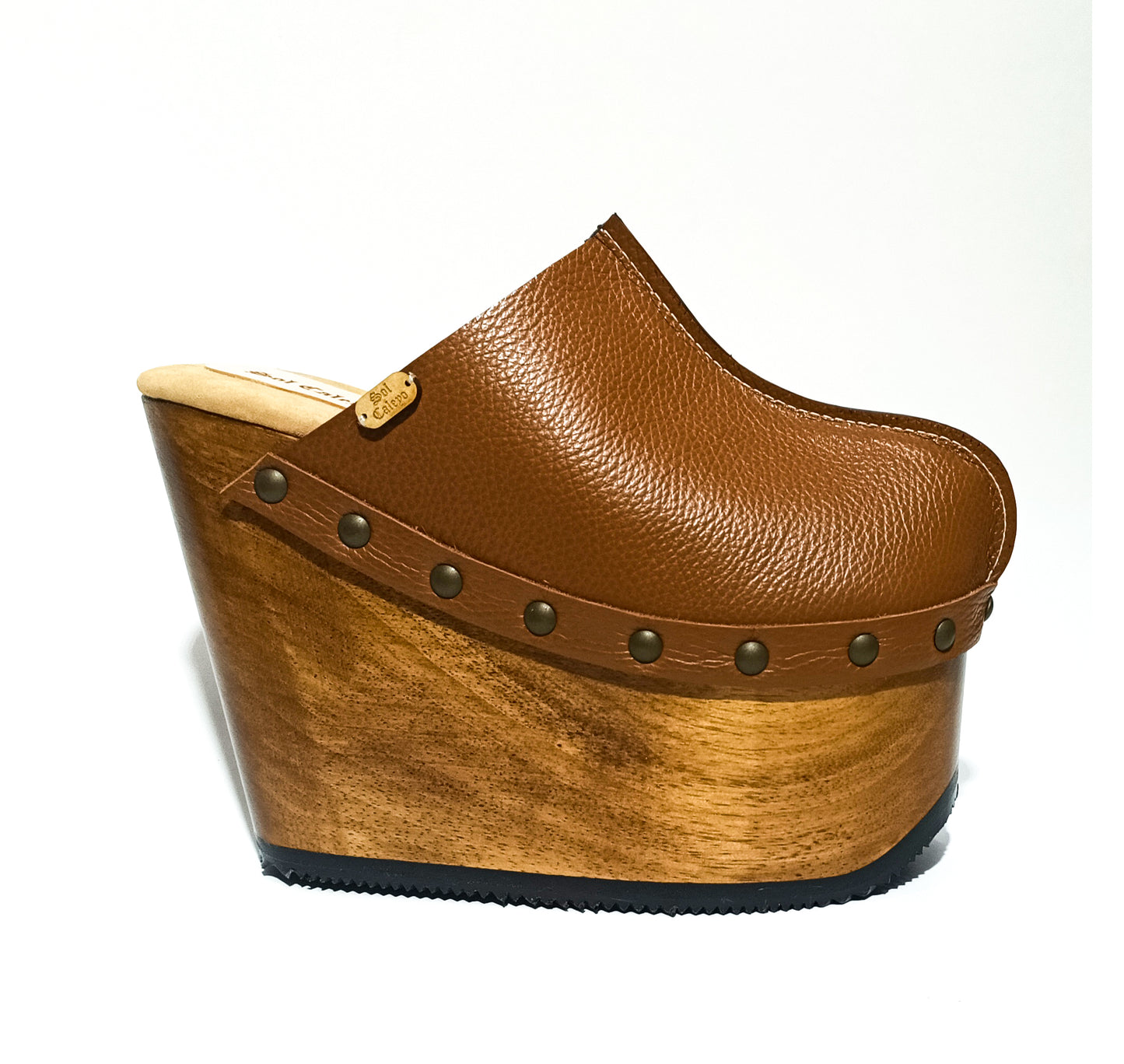 Vintage inspired, 70s style platform clogs with super high heels. Super high wooden wedge made in closed leather. Size from 34 to 47. Handmade to order. The Chicago Clogs are an exclusive design by Sol Caleyo.