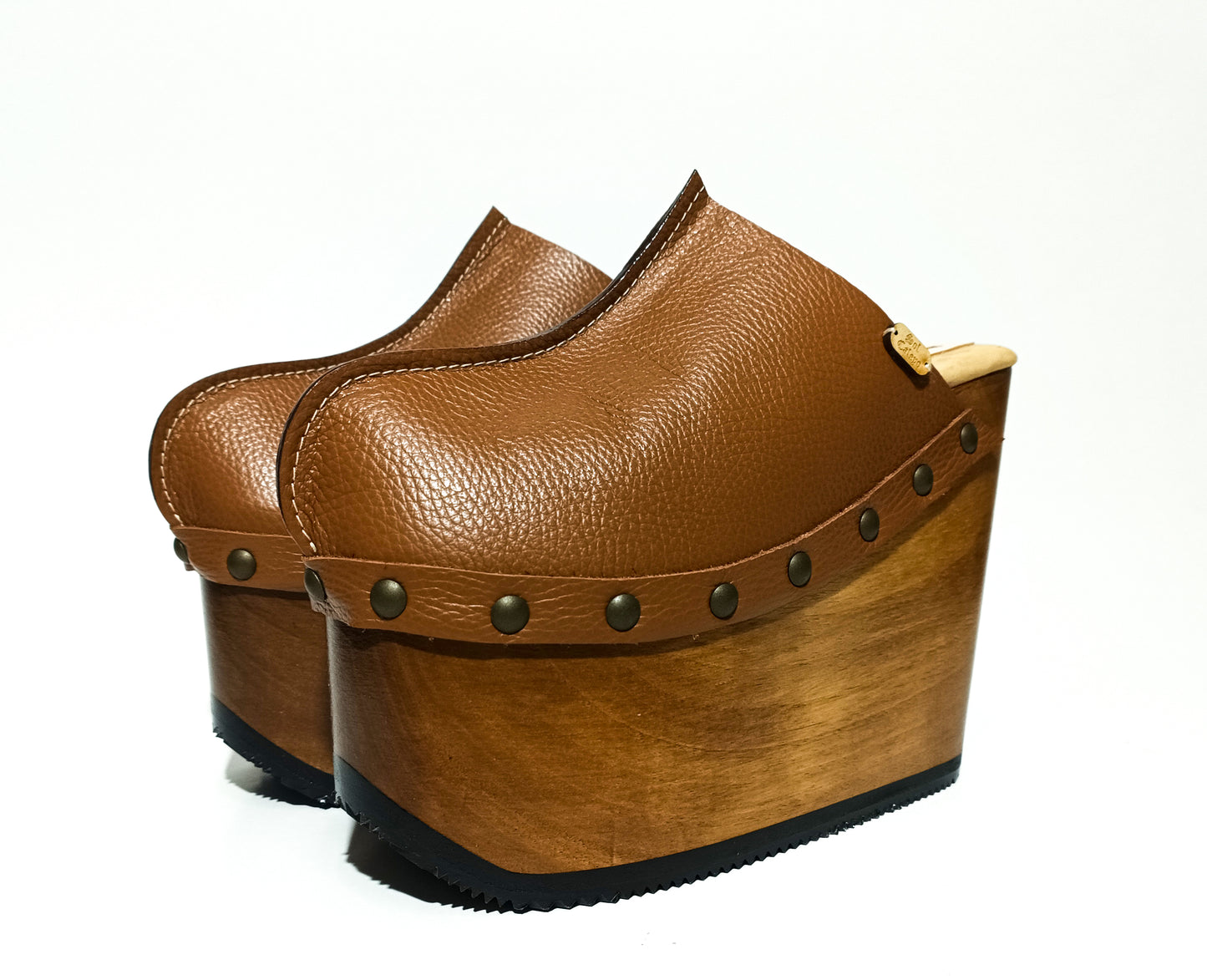 Vintage inspired, 70s style platform clogs with super high heels. Super high wooden wedge made in closed leather. Size from 34 to 47. Handmade to order. The Chicago Clogs are an exclusive design by Sol Caleyo.