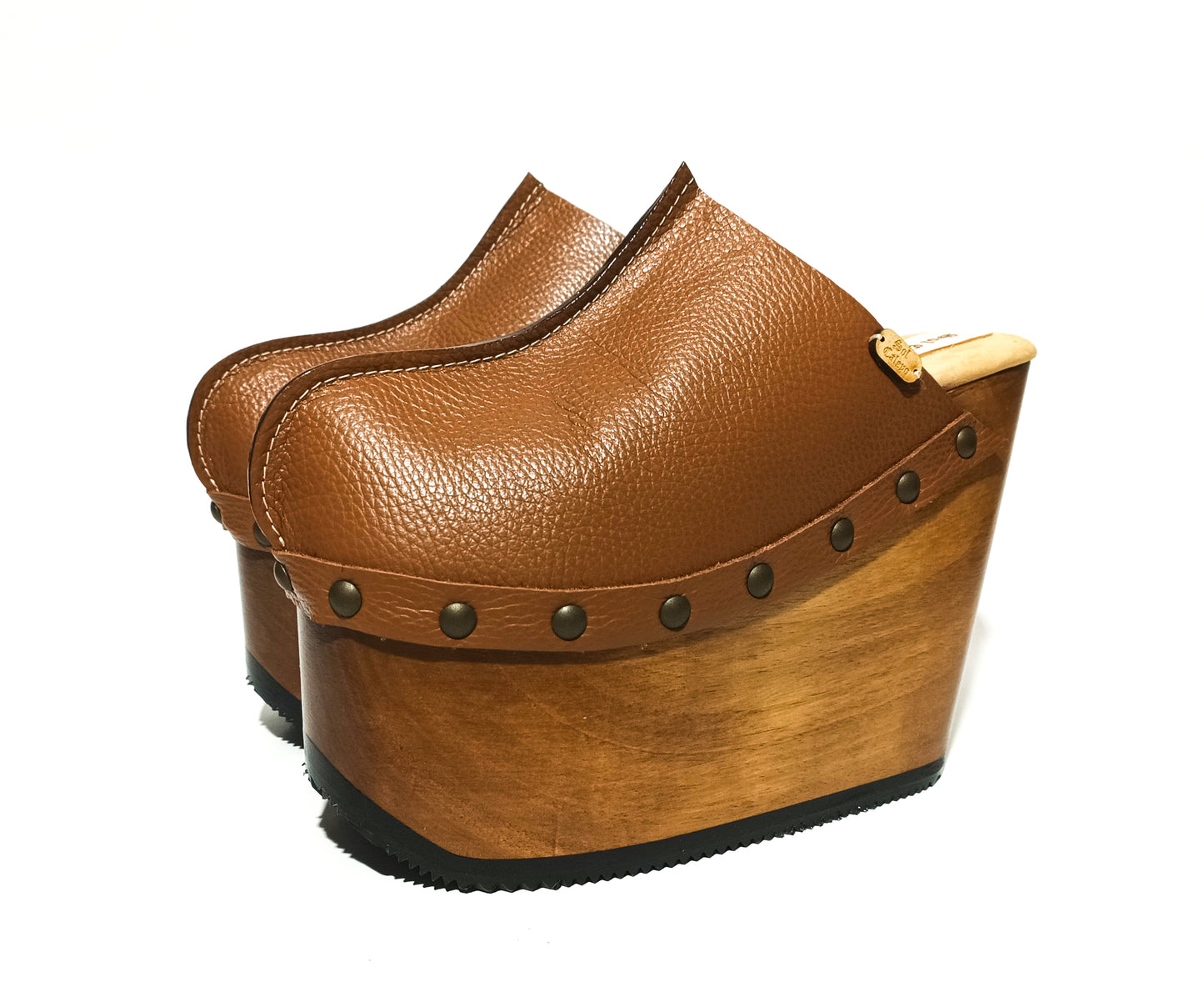 Vintage inspired, 70s style platform clogs with super high heels. Super high wooden wedge made in closed leather. Size from 34 to 47. Handmade to order. The Chicago Clogs are an exclusive design by Sol Caleyo.