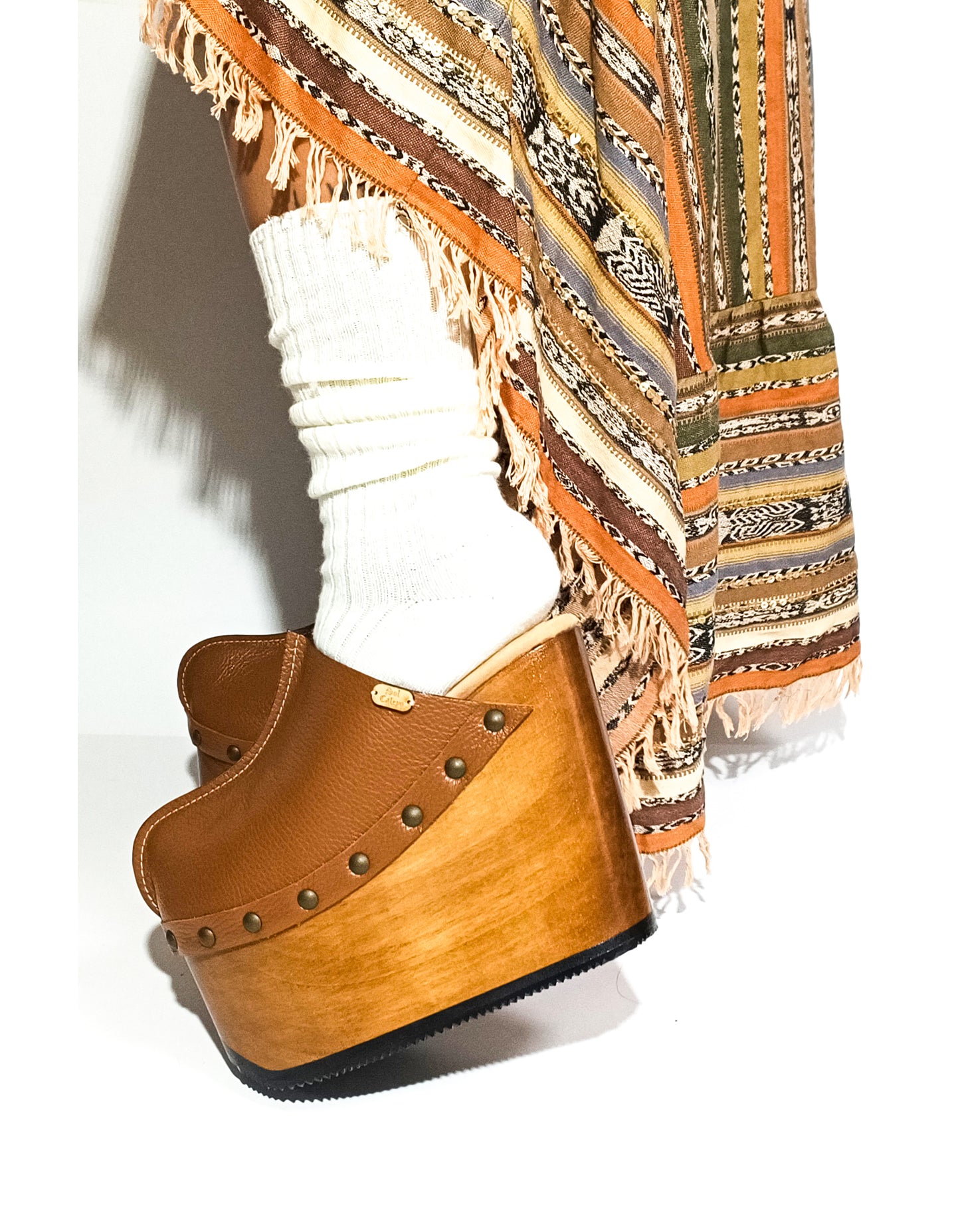 Vintage inspired, 70s style platform clogs with super high heels. Super high wooden wedge made in closed leather. Size from 34 to 47. Handmade to order. The Chicago Clogs are an exclusive design by Sol Caleyo.