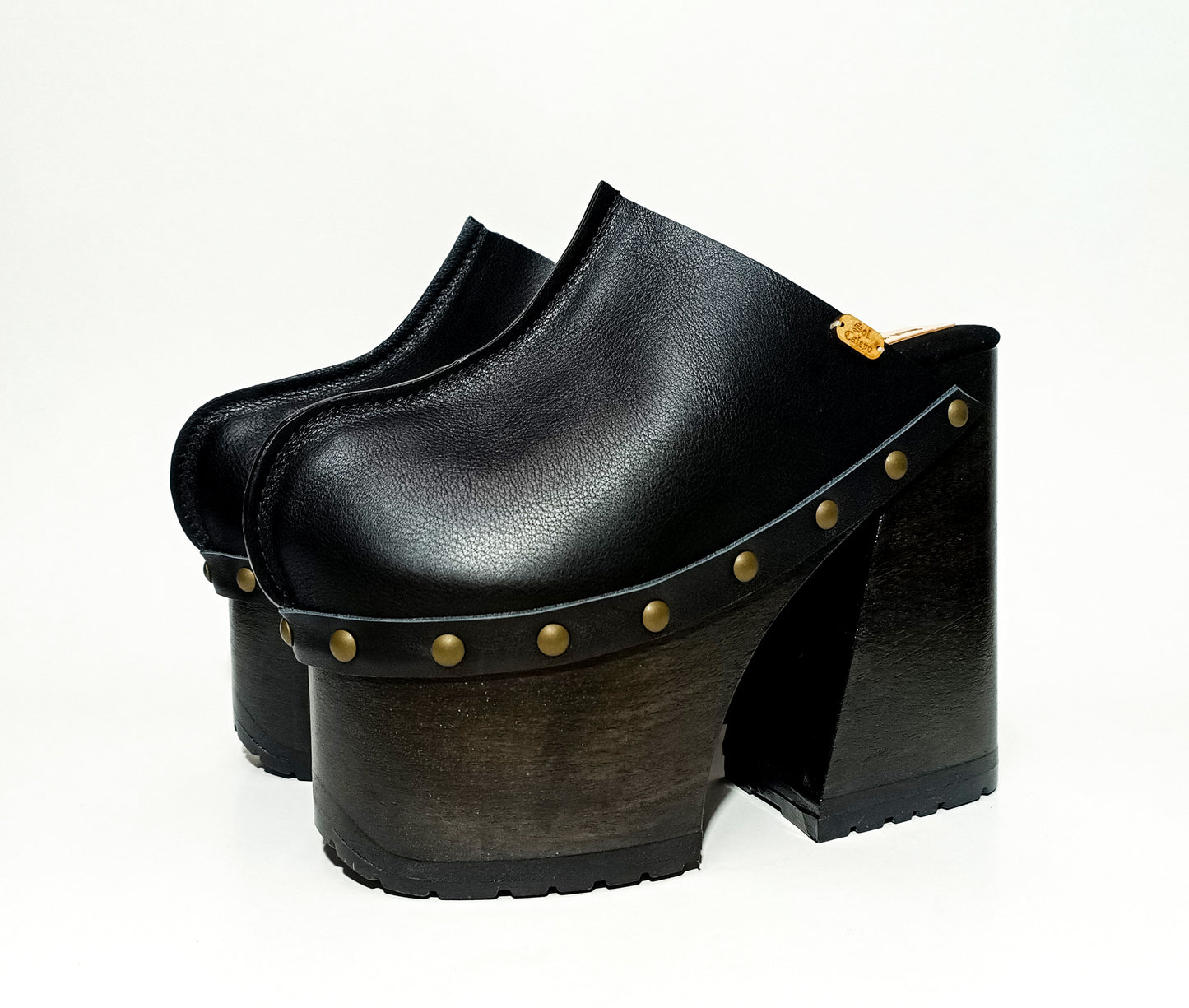 Vintage 70s style platform clogs, with super high heel, made in black leather. Sizes 34 to 47, handmade. Reserve yours now! Show an authentic vintage style!