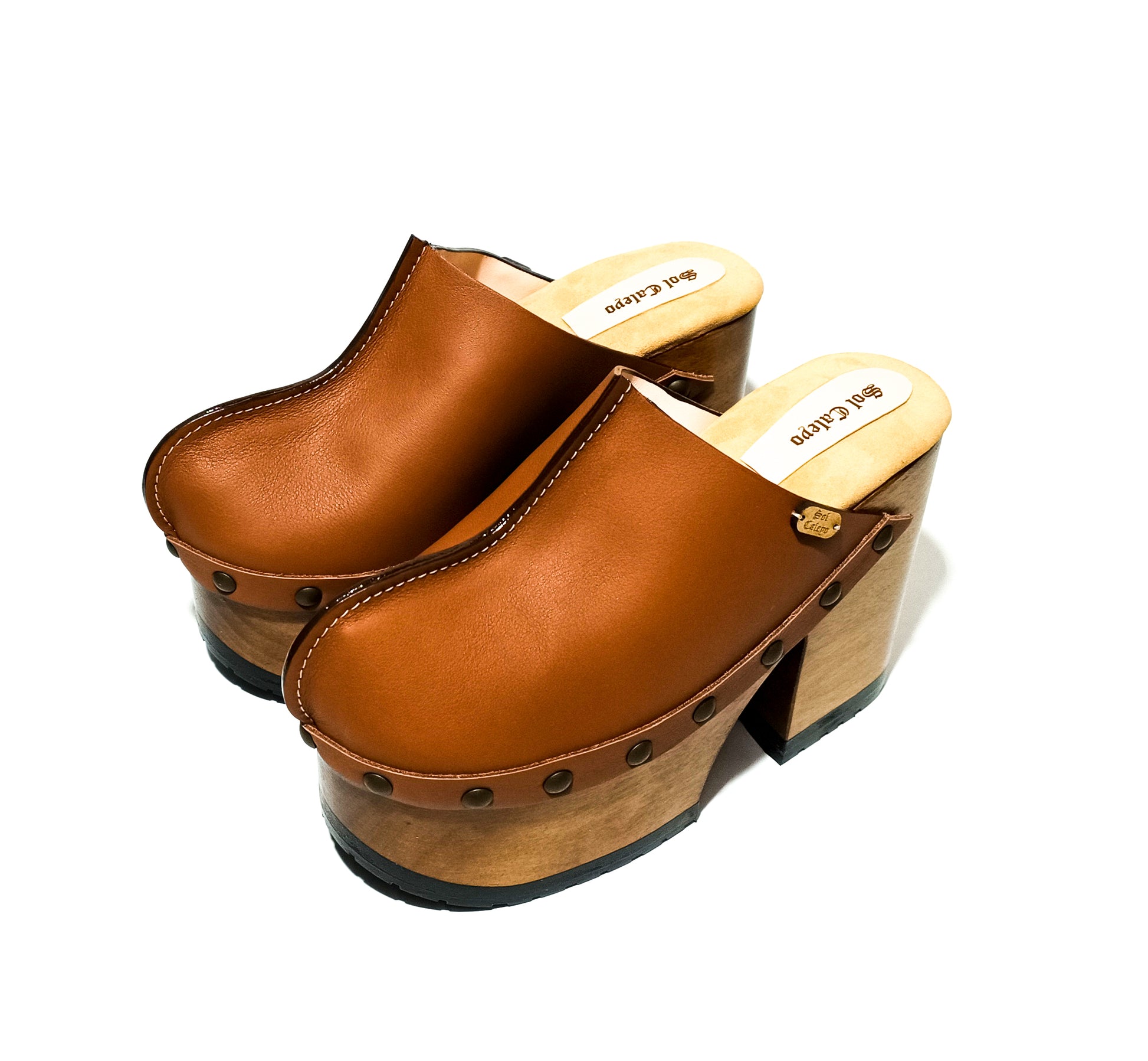 Clogs with platform and high heel in vintage inspiration, 70's style. Closed wooden heel in light brown leather. Sizes 34 to 47. Handmade to order. The Vintage Clogs are an exclusive design by Sol Caleyo.