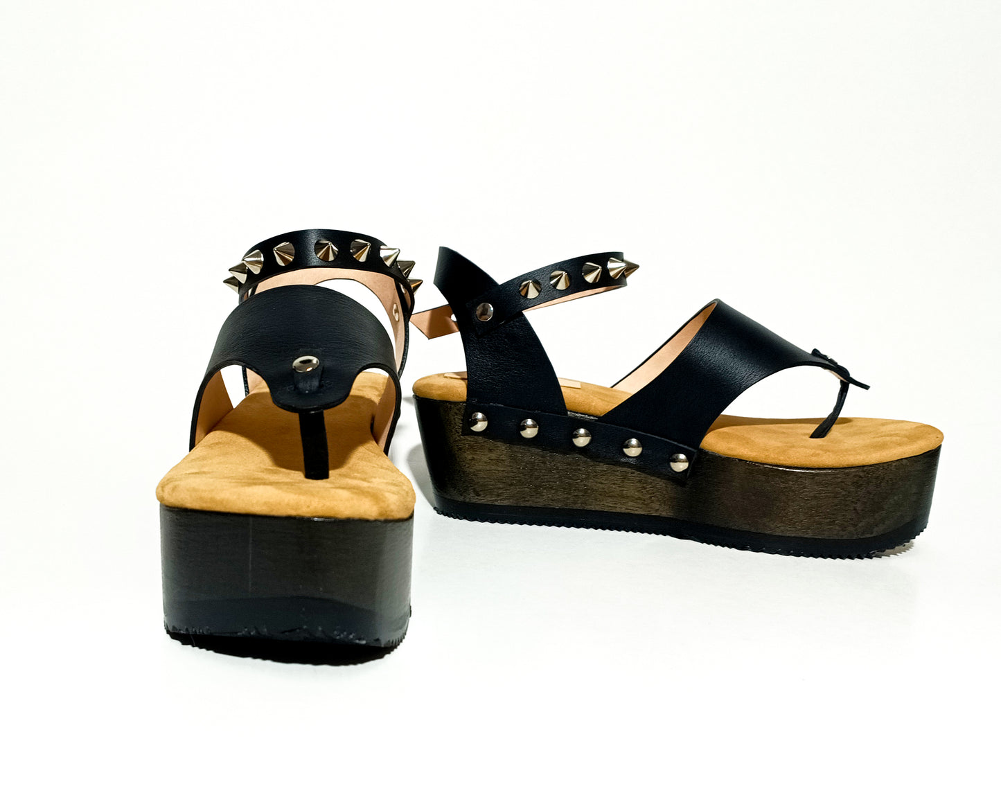 Wooden wedge sandal flip flop style. Flip flop style clog sandal. Flip flop style sandal with silver studs. Sizes 34 to 47. Handmade leather shoes by sol Caleyo.