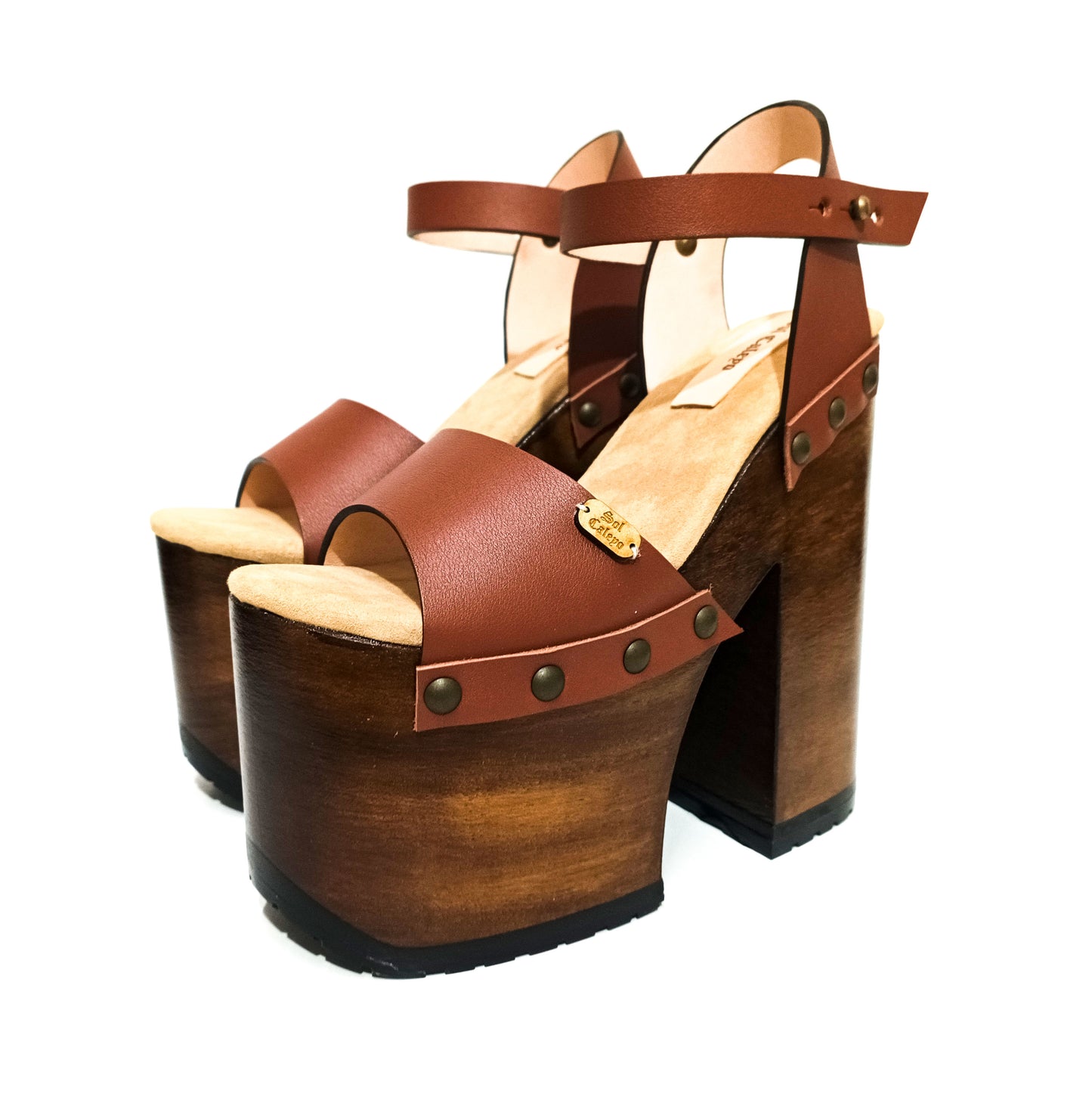 Handcrafted brown leather clogs sandals with wooden soles, high platforms, and heels
