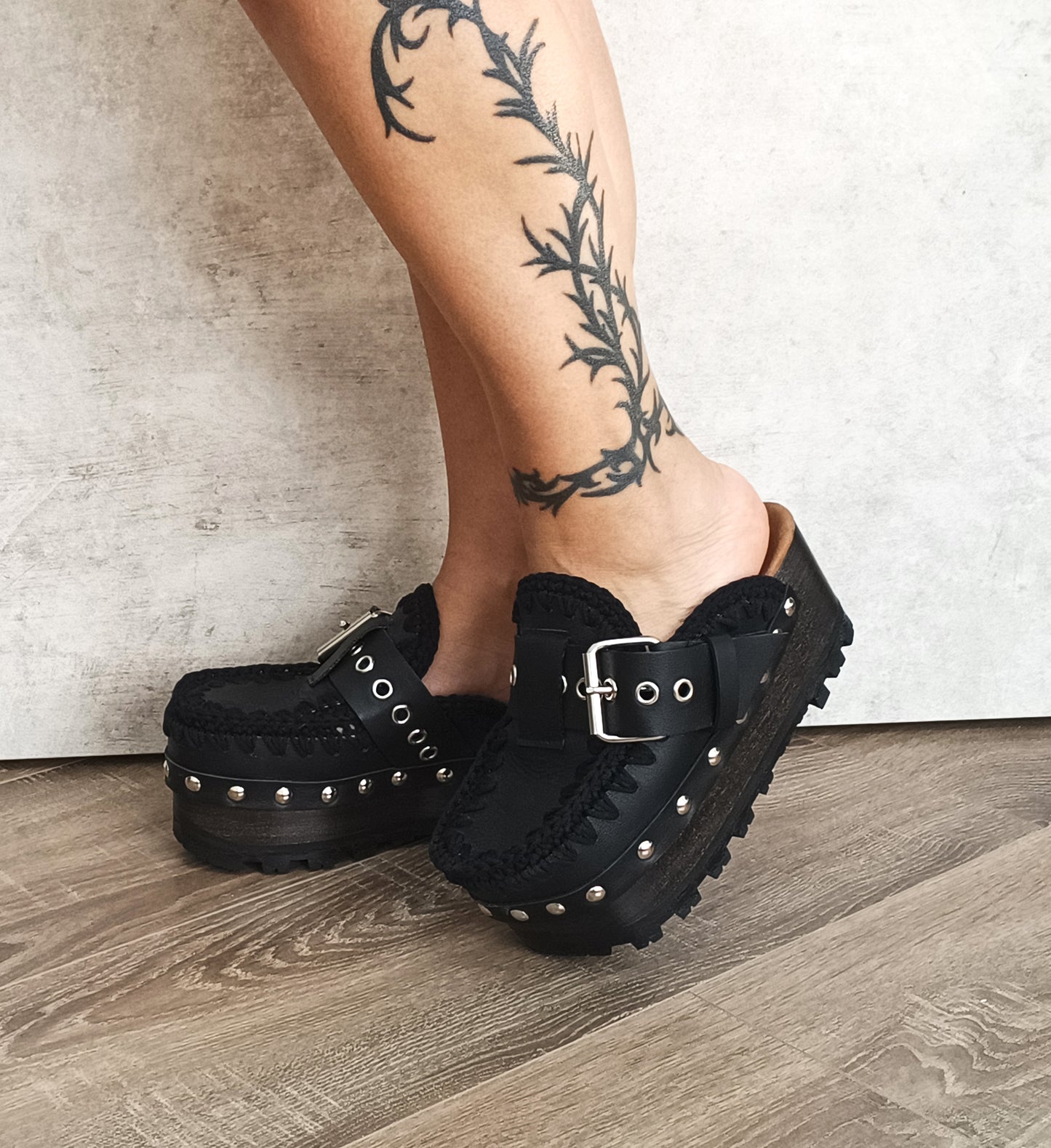 Oxford style wooden wedge clogs, black leather clogs with buckle and silver studs. High quality handmade shoes by Sol Caleyo.
