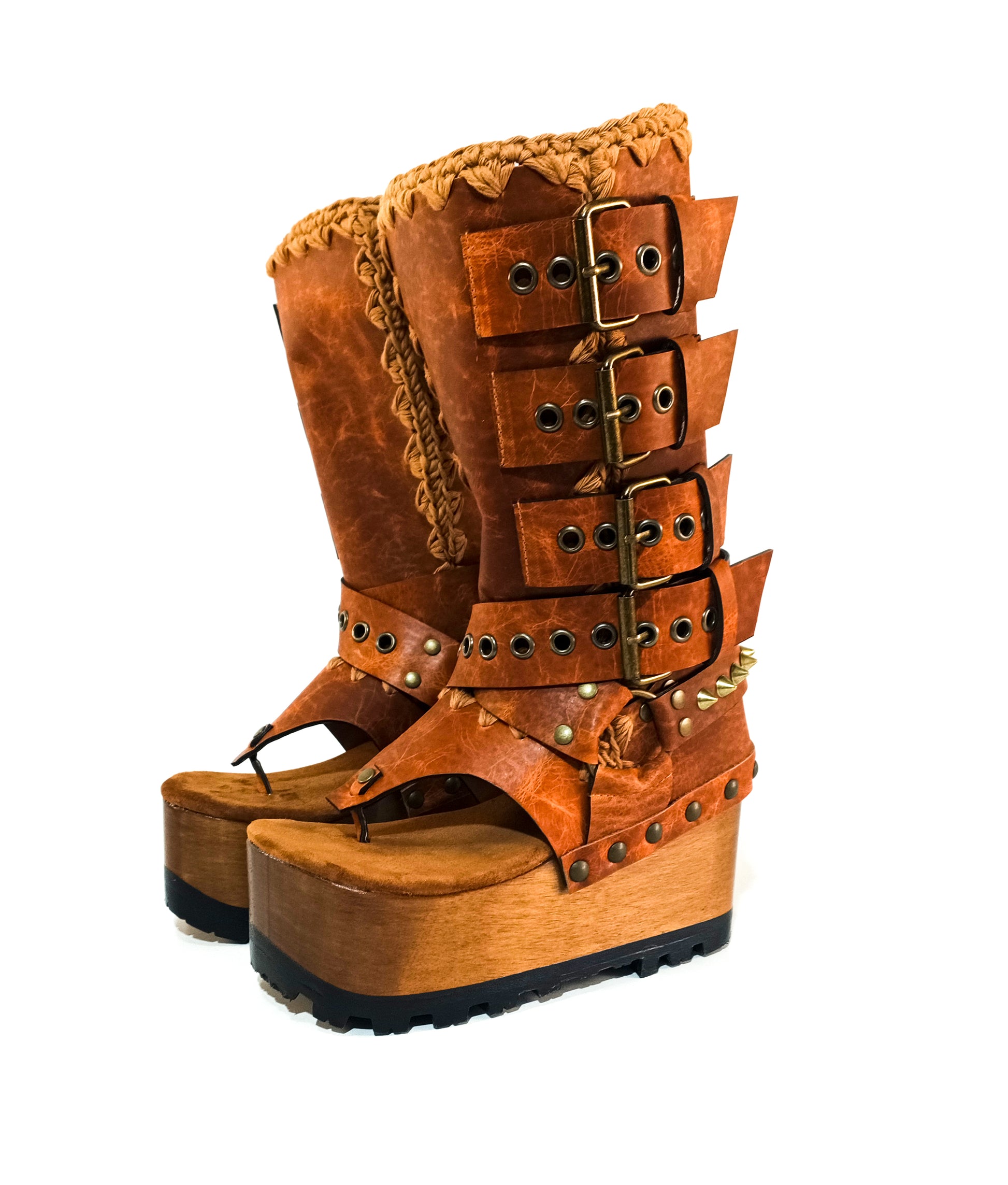 Leather biker style boots. Thong style boot. Thong sandal with wooden wedge. High-end footwear handmade by Sol Caleyo.