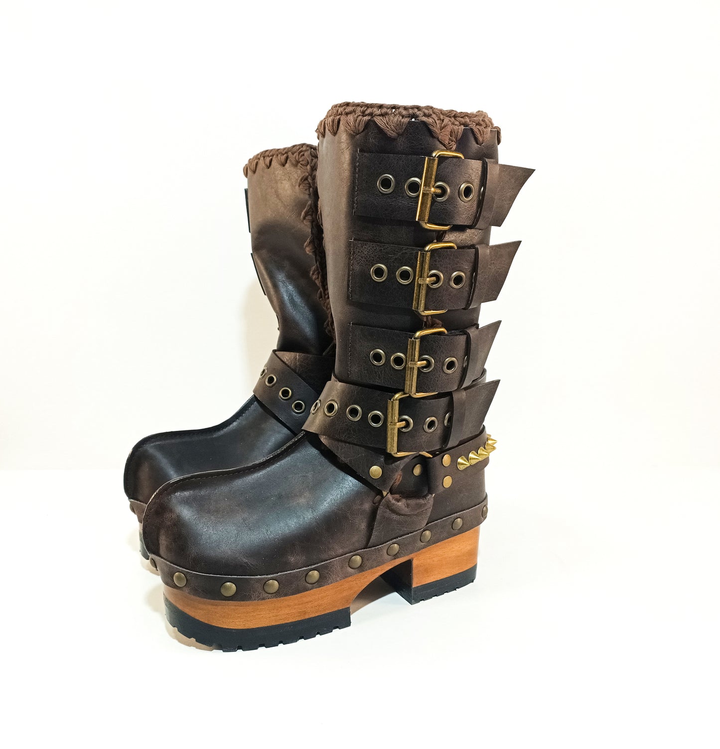 Handmade leather clogs. Dark brown leather biker boots. Leather boots with wooden heels. Leather boots with buckles. High-end footwear handmade by Sol Caleyo.