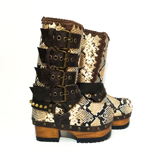 Handmade snake skin clogs. Biker-style snake boots. Leather boots with wooden heels. High-end footwear handmade by Sol Caleyo.