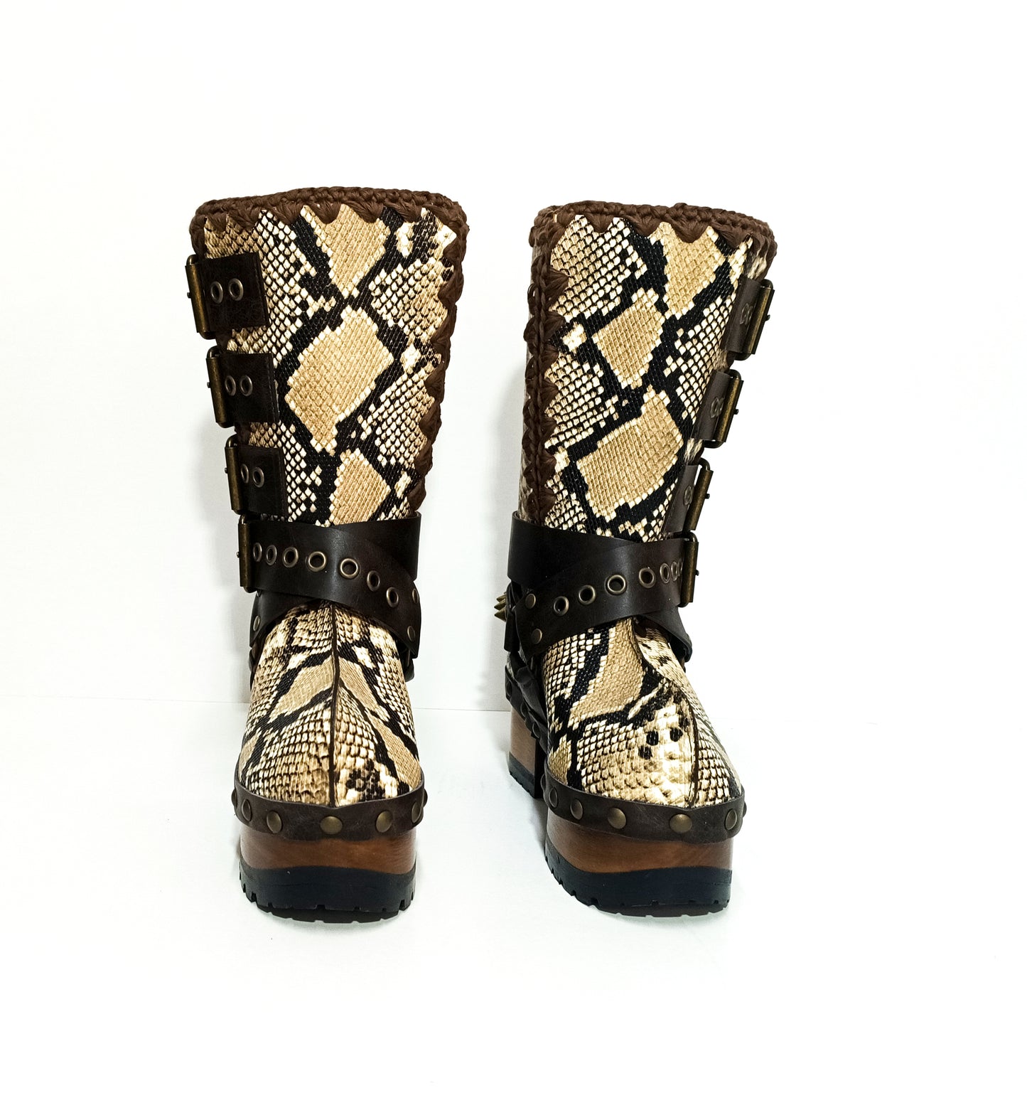 Handmade snake skin clogs. Biker-style snake boots. Leather boots with wooden heels. High-end footwear handmade by Sol Caleyo.