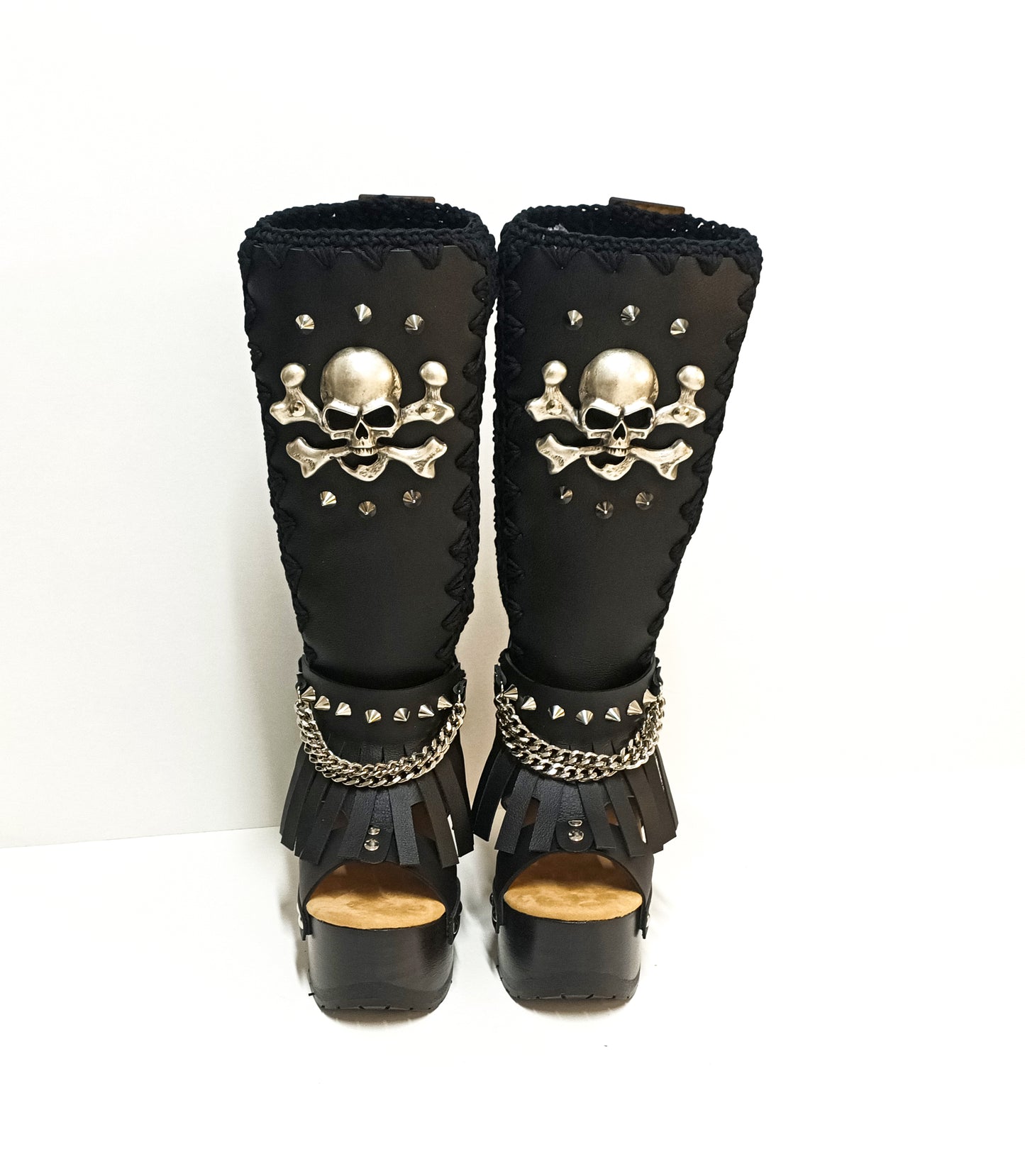 Black leather boots with skull and silver studs. Black platform boots with high heels. Black leather biker boots with metal skull. Sizes 34 to 47. High-end leather footwear handmade by Sol Caleyo.