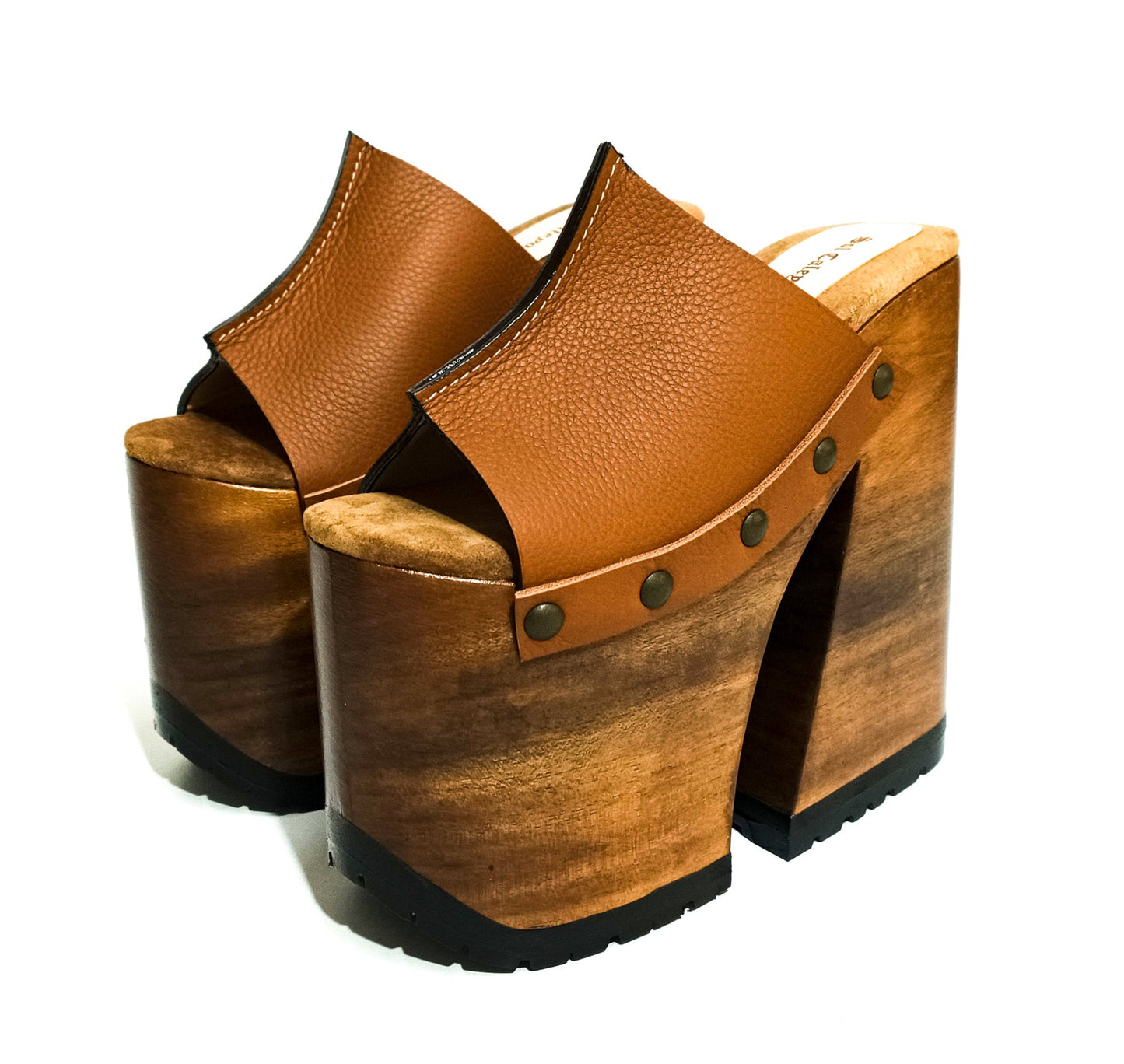 Side profile of Camel Luxury Queen Sandals by Sol Caleyo, featuring a high 17cm bell-style wooden heel, an 11cm platform, and premium camel brown leather with bronze stud detailing on a crisp white background.