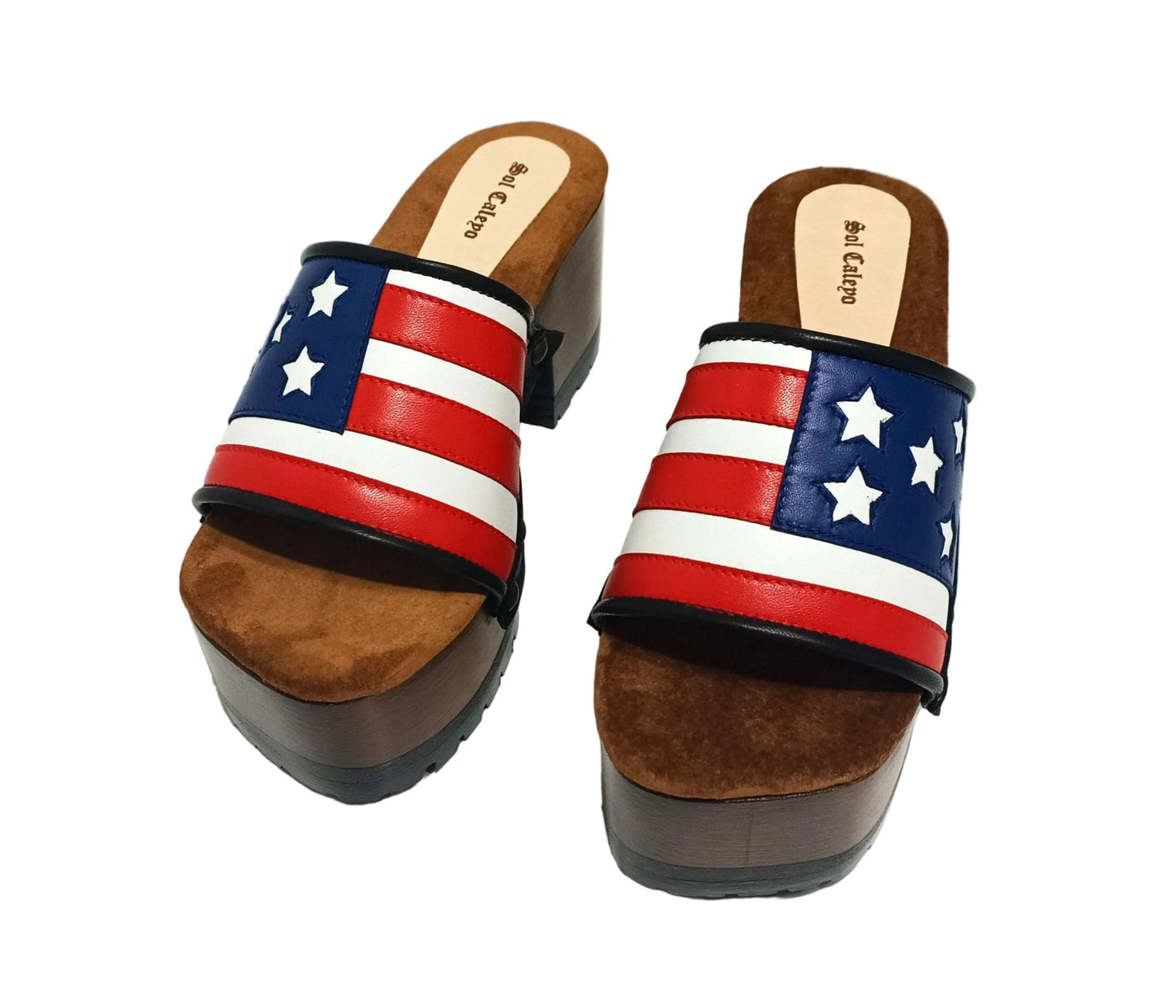 American Sandals XS by Sol Caleyo: close-up of handmade wooden platform sandals with USA flag leather strap and studs.