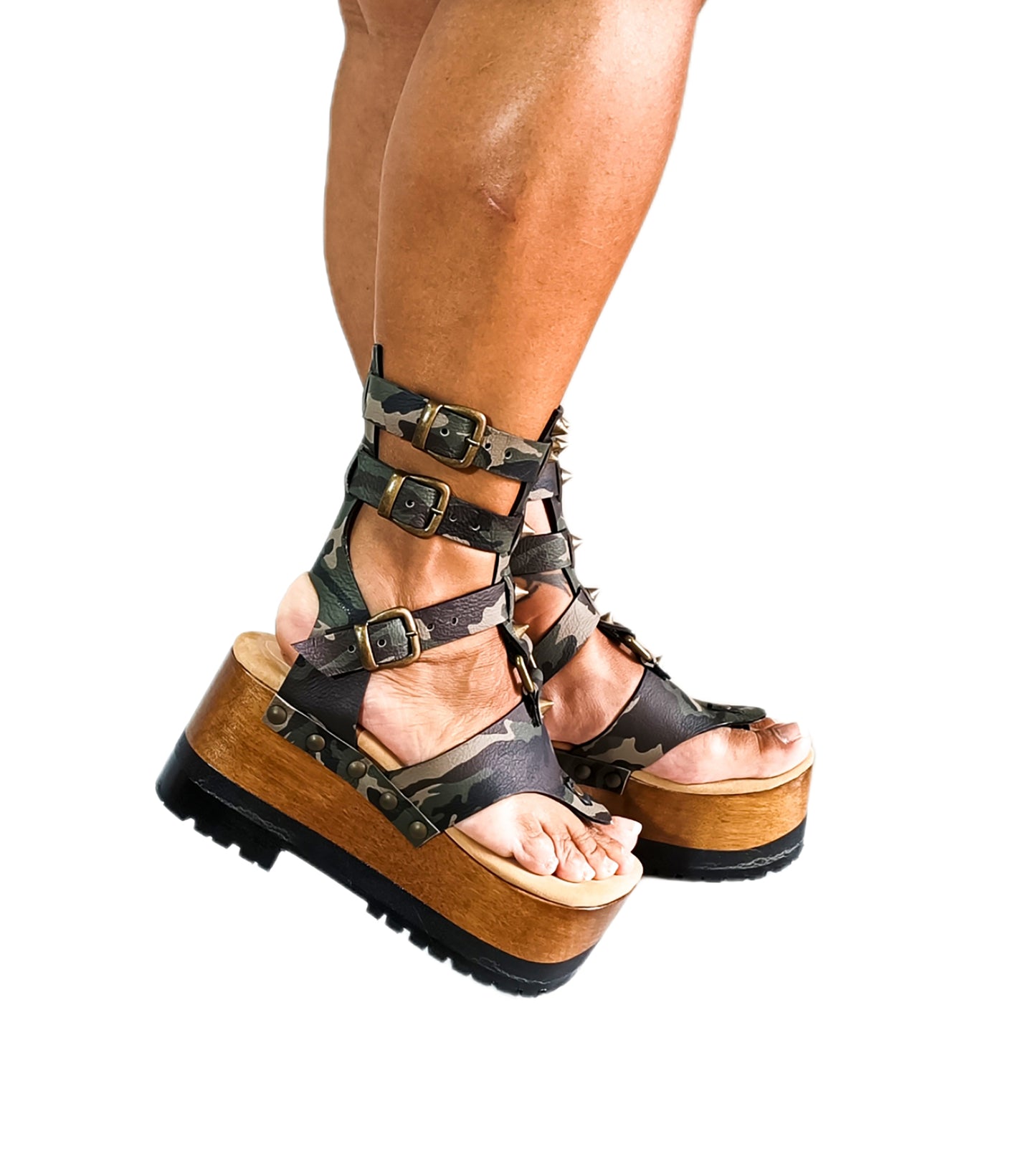 Flip-flop style sandals made in camouflage leather decorated with old gold studs. Sizes 34 to 47. Gladiator military flip flops are an exclusive design by Sol Caleyo.