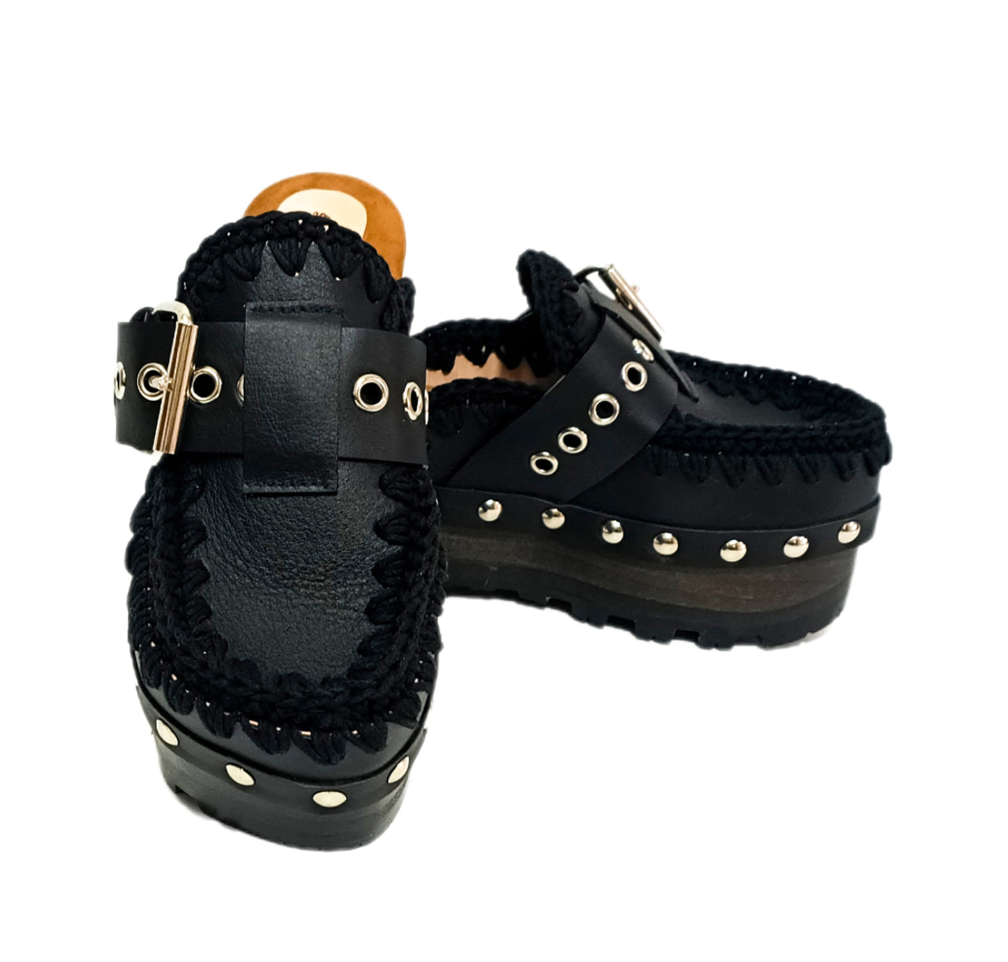Oxford style wooden wedge clogs, black leather clogs with buckle and silver studs. High quality handmade shoes by Sol Caleyo.
