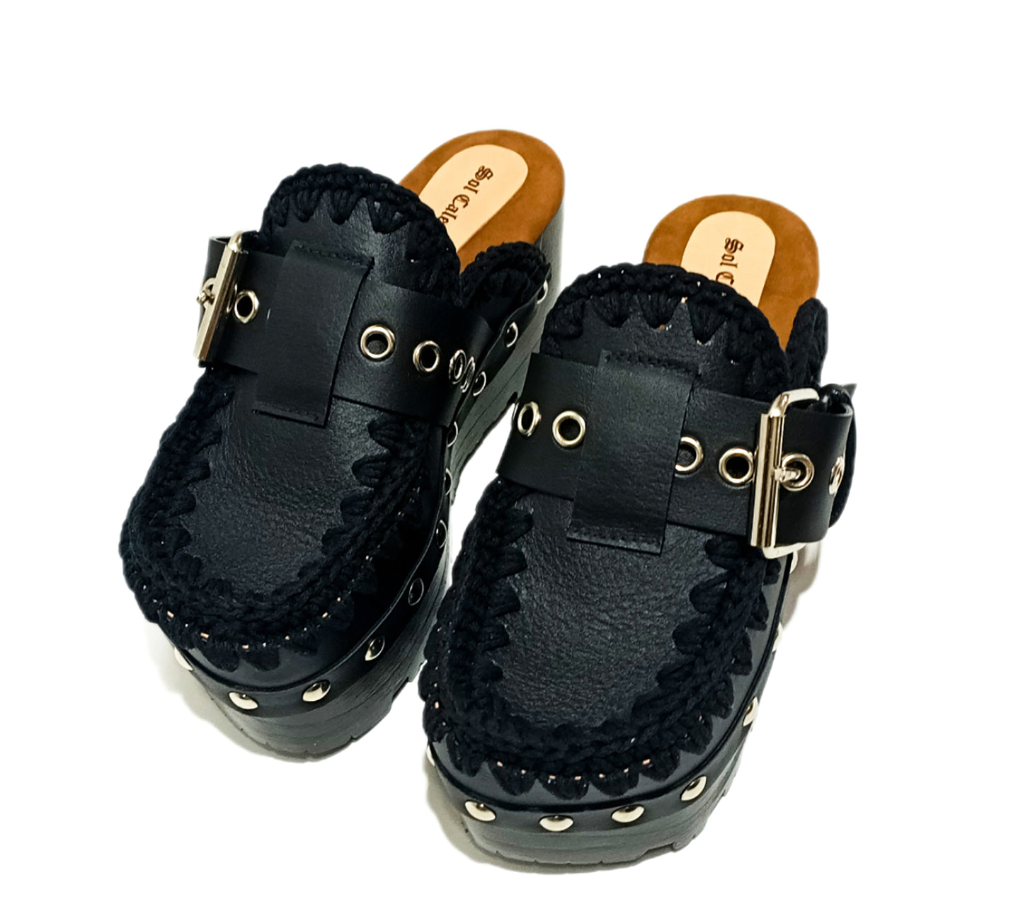 Oxford style wooden wedge clogs, black leather clogs with buckle and silver studs. High quality handmade shoes by Sol Caleyo.