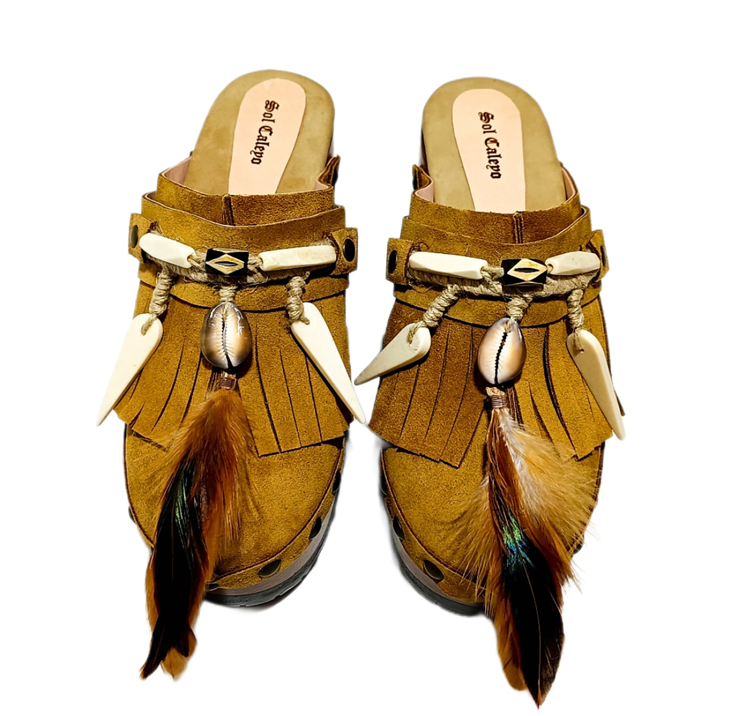 Bohemian style clogs, natural shell accessories, leather clogs decorated with feathers and natural shells. Boho style leather clogs. High-end handmade footwear by Sol Caleyo.