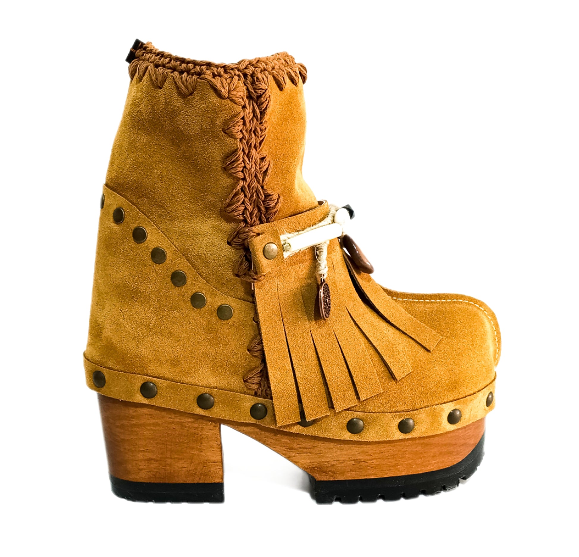 Bohemian style boots in camel suede leather. Clogs boots with handmade wooden heel. Bohemian style boots decorated with bangs, horns, coins and natural shell. High-end handmade footwear by Sol Caleyo.