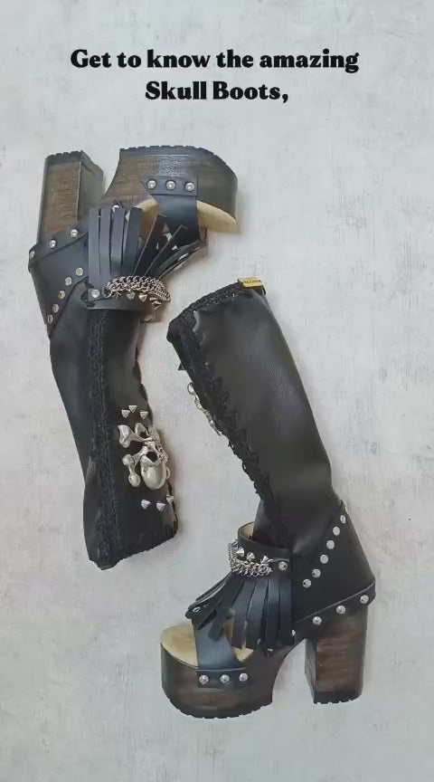 Black leather boots with skull and silver studs. Black platform boots with high heels. Black leather biker boots with metal skull. Sizes 34 to 47. High-end leather footwear handmade by Sol Caleyo.