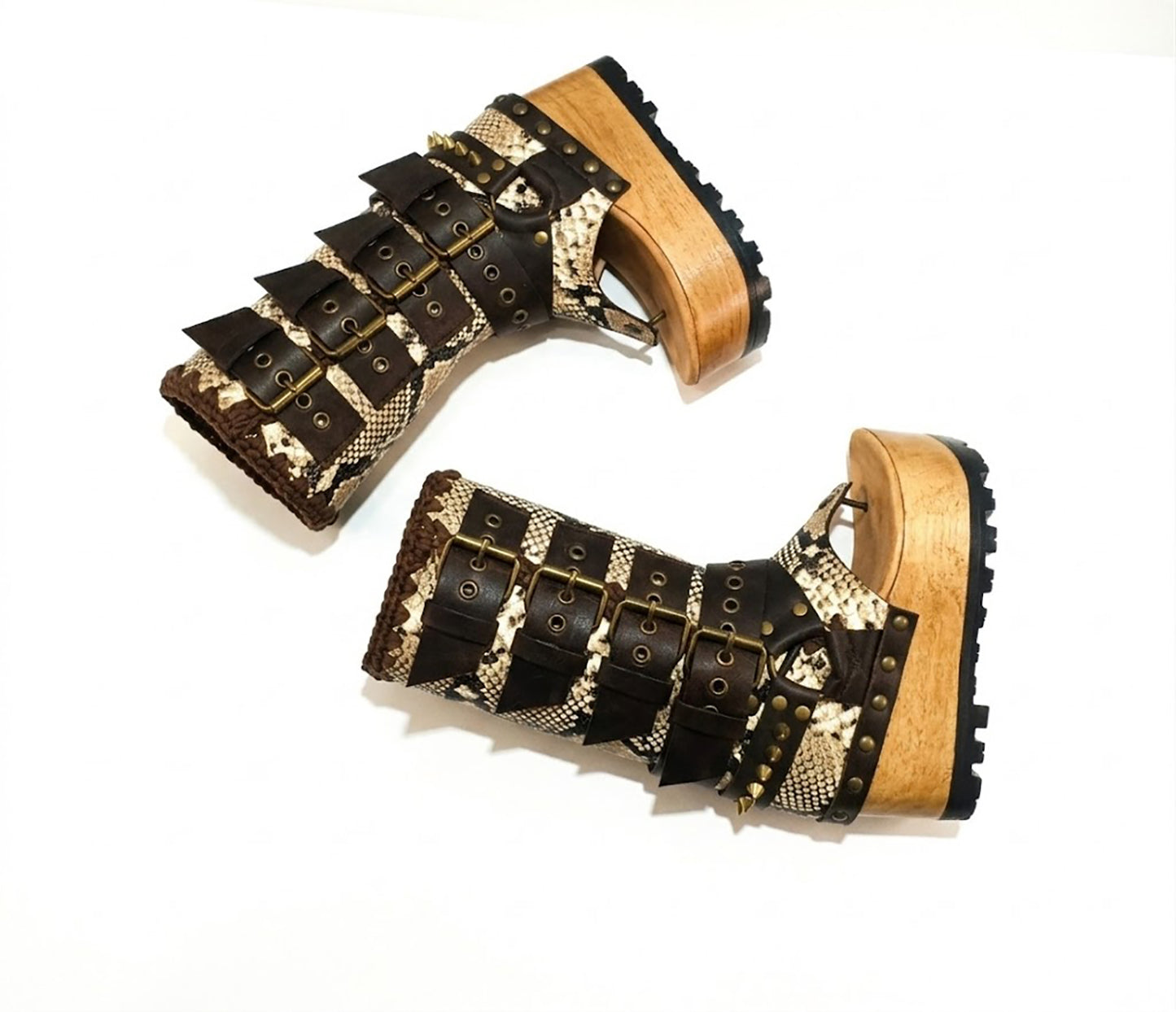 Close-up of handmade Alabama Flip Flops Snake Boots by Sol Caleyo, showing the textured snake-effect leather, 10 cm wooden wedge, and durable black Vibram tractor sole.