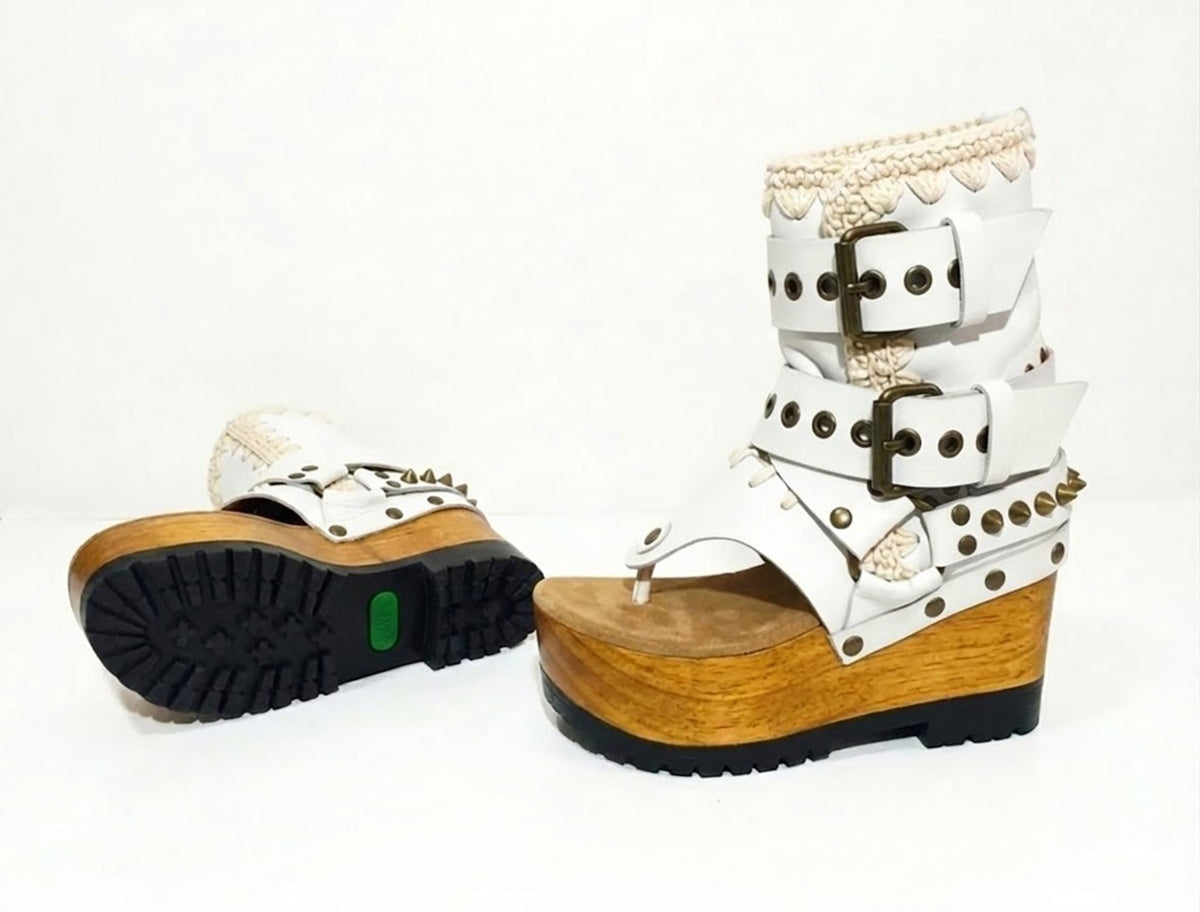 Sol Caleyo Kenya Flip Flop White Boots: handmade white leather platform sandals with wooden wedge, tractor sole, and gold biker buckles.