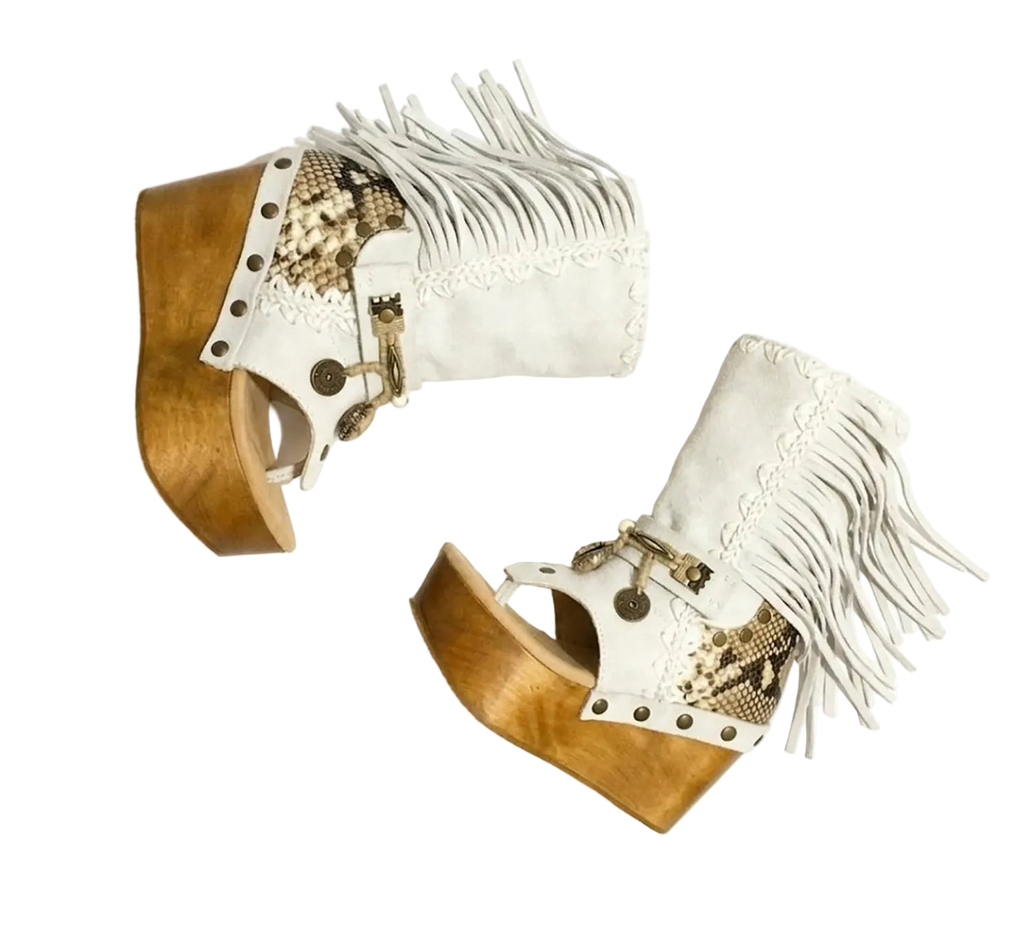 Atenea White Flip Flop Boots by Sol Caleyo, featuring premium white suede, bohemian fringe, shell decorations, and a chunky wooden platform heel against a white background.