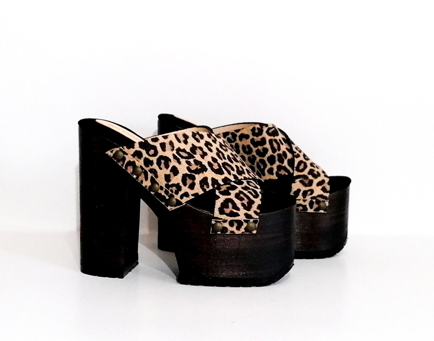 Leopard leather clogs with platform and super high heel. Leather mule with super high wooden heel. Vintage 70's style leather clogs. Vintage style super high heel sandal. Sizes 34 to 47. High quality leather shoes handmade by sol Caleyo. Sustainable fashion.