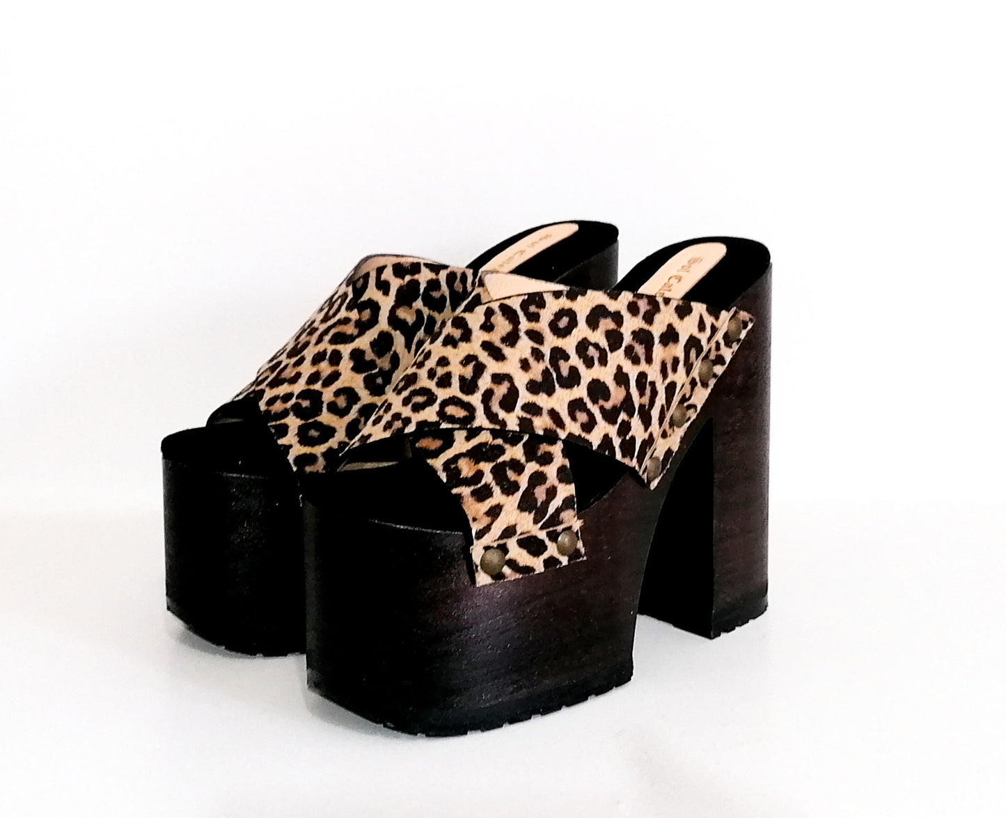 Leopard leather clogs with platform and super high heel. Leather mule with super high wooden heel. Vintage 70's style leather clogs. Vintage style super high heel sandal. Sizes 34 to 47. High quality leather shoes handmade by sol Caleyo. Sustainable fashion.