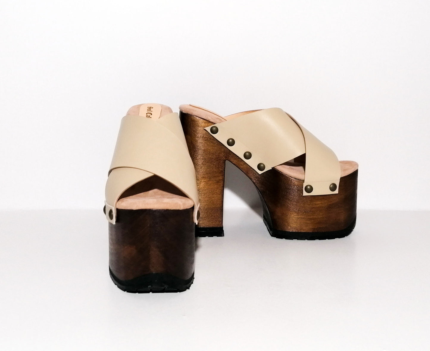 Beige leather clogs with platform and super high heel. Leather mule with super high wooden heel. Vintage 70's style leather clogs. Vintage style super high heel sandal. Sizes 34 to 47. High quality leather shoes handmade by sol Caleyo. Sustainable fashion.