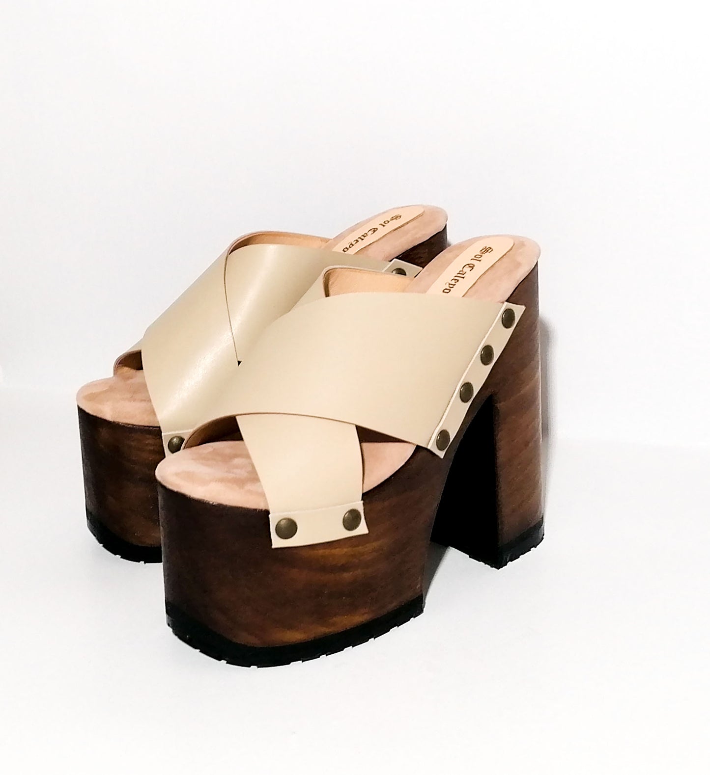 Beige leather clogs with platform and super high heel. Leather mule with super high wooden heel. Vintage 70's style leather clogs. Vintage style super high heel sandal. Sizes 34 to 47. High quality leather shoes handmade by sol Caleyo. Sustainable fashion.