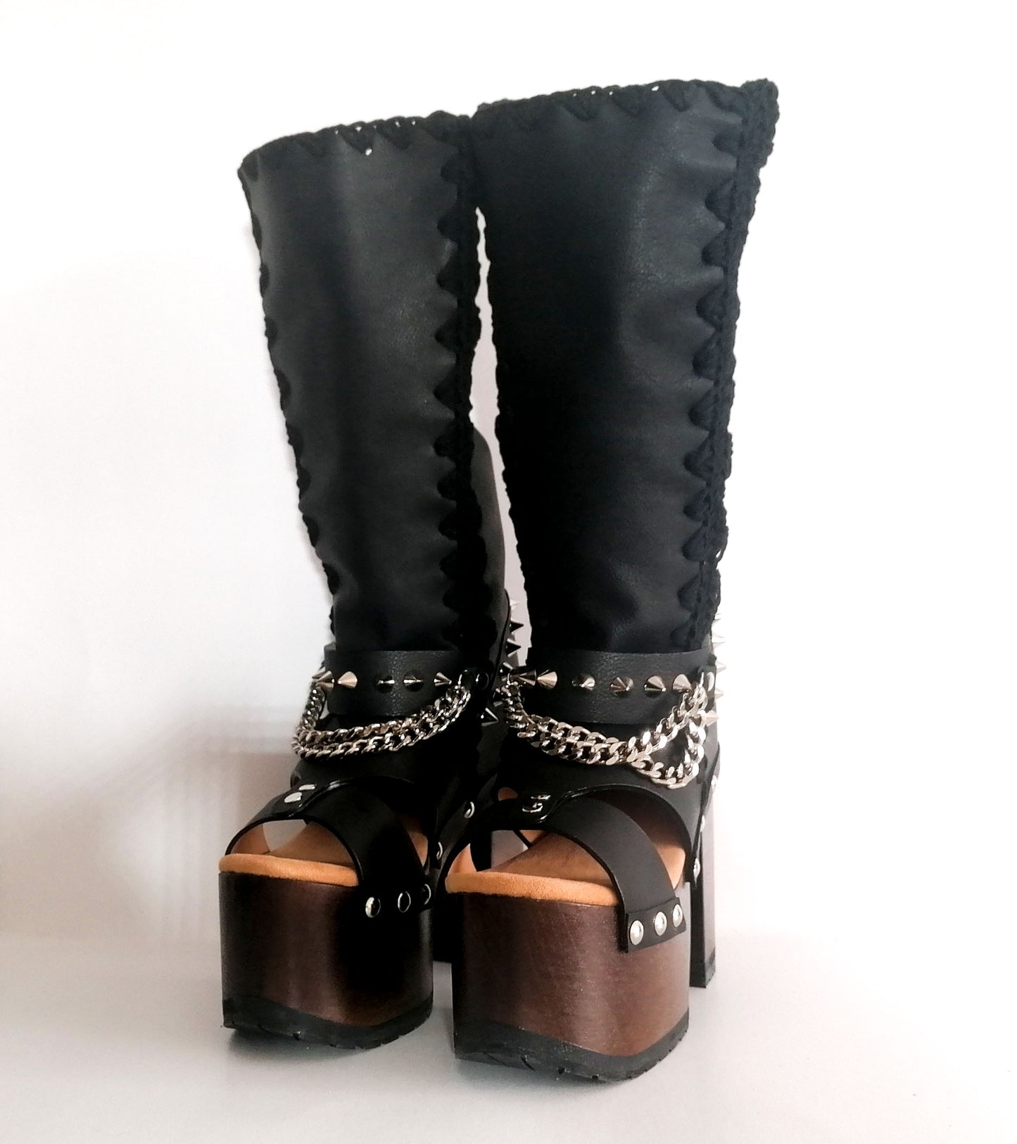 Black platform sandal with super high heel. Black super high heel platform boot with studs and silver chains. Super high heel biker style boot. Sizes 34 to 47. Handmade leather shoes by sol Caleyo.