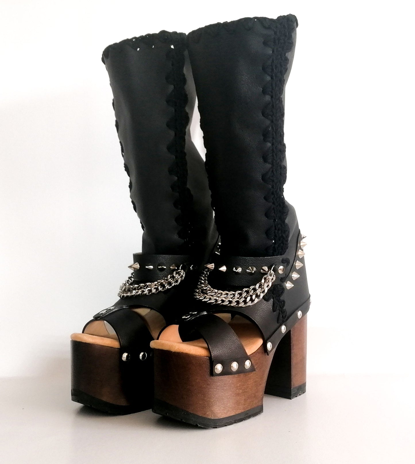 Black platform sandal with super high heel. Black super high heel platform boot with studs and silver chains. Super high heel biker style boot. Sizes 34 to 47. Handmade leather shoes by sol Caleyo.