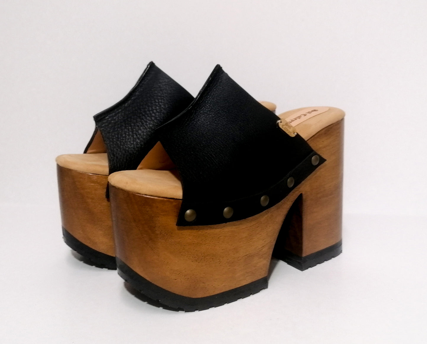 Vintage style black leather platform clog sandal. Super high wooden heel sandal. Vintage 70's style platform sandal. Sizes 34 to 47. High quality leather shoes handmade by sol Caleyo. Sustainable fashion.