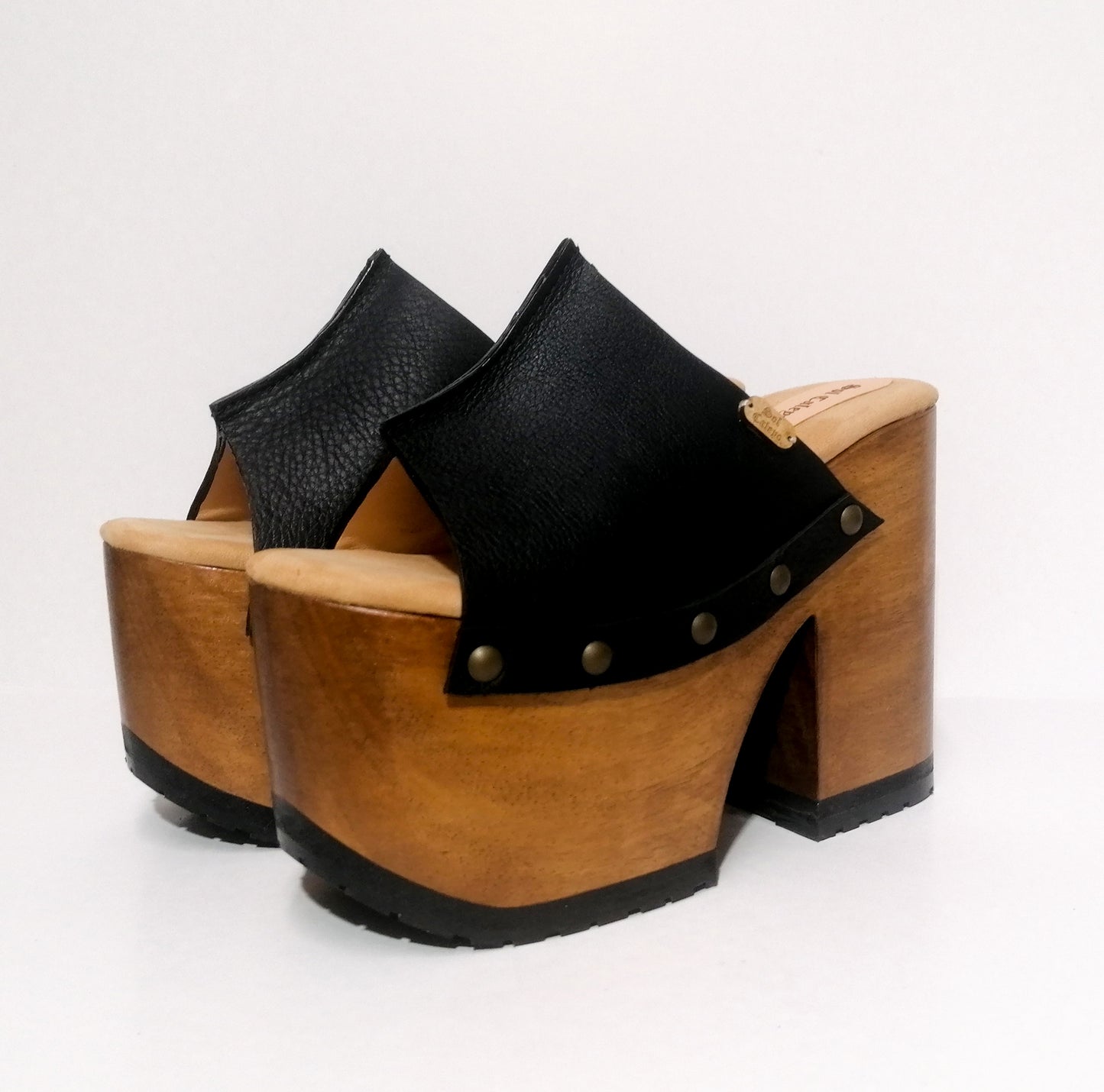 Vintage style black leather platform clog sandal. Super high wooden heel sandal. Vintage 70's style platform sandal. Sizes 34 to 47. High quality leather shoes handmade by sol Caleyo. Sustainable fashion.