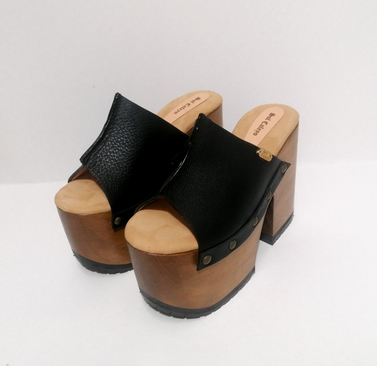Vintage style black leather platform clog sandal. Super high wooden heel sandal. Vintage 70's style platform sandal. Sizes 34 to 47. High quality leather shoes handmade by sol Caleyo. Sustainable fashion.