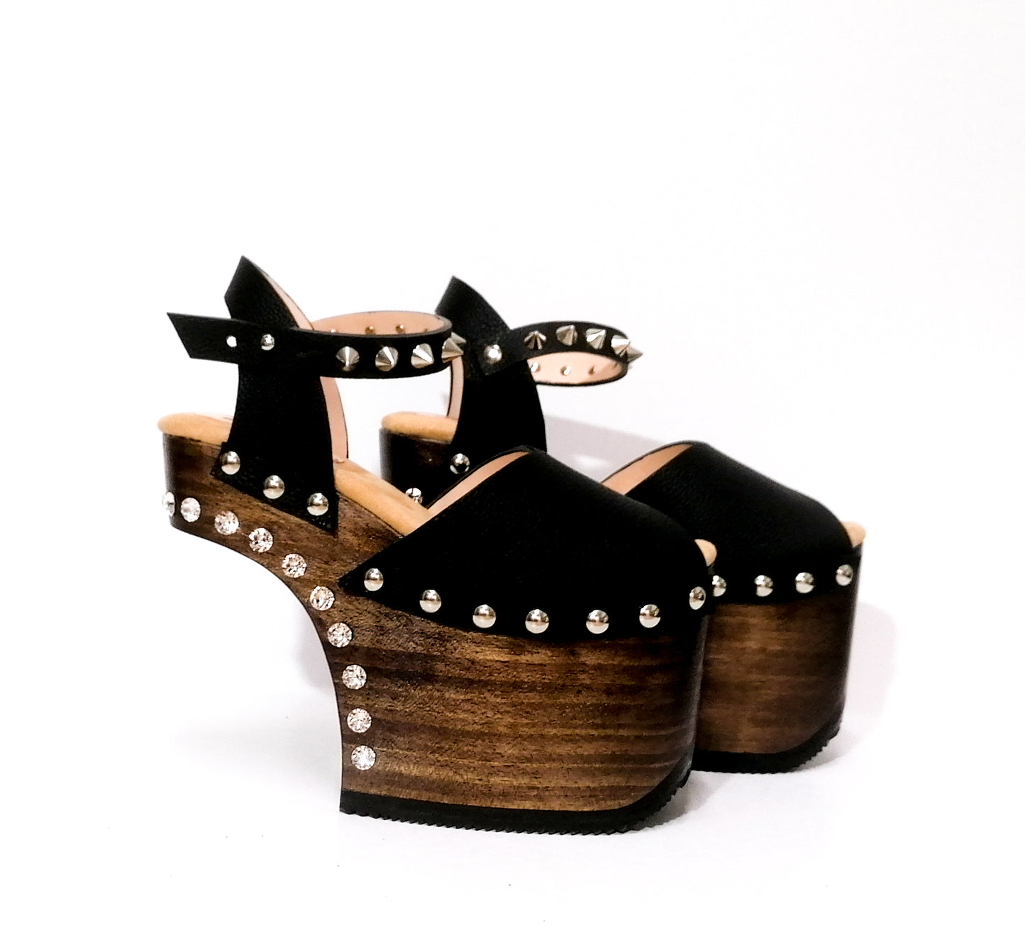 Black leather platform sandal with silver studs. Wooden wedge heel in C decorated with swarovski crystals. Super high heel sandal with genuine swarovski crystals. Super high heel sandal without heel. Sizes 34 to 47. High quality leather shoes handmade by sol Caleyo. Sustainable fashion.